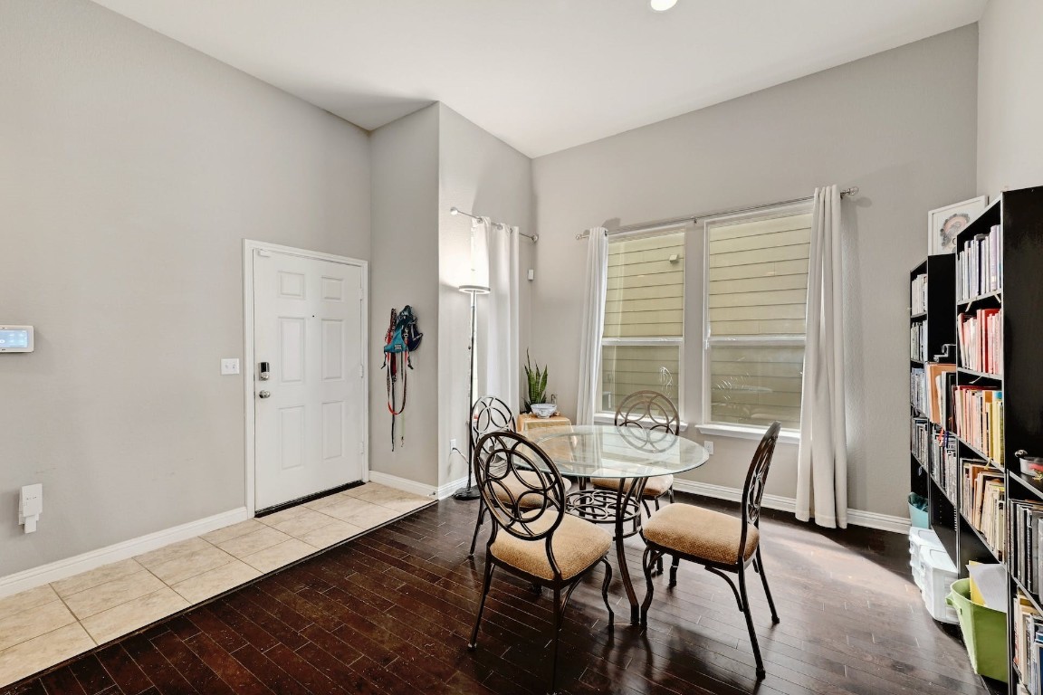 10104 Wading Pool Path Austin, TX 78748 - Photo 4 of 25 a view of a dining room with furniture and a book shelf
