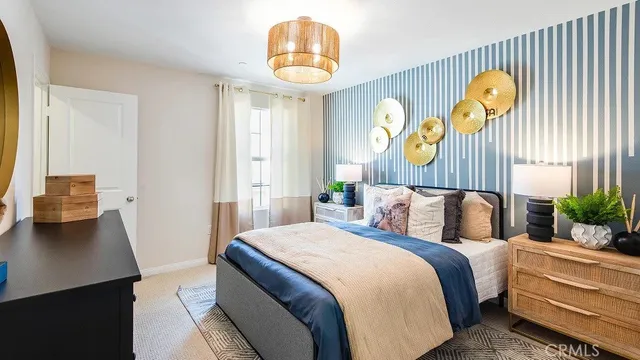 a bedroom with bed and window