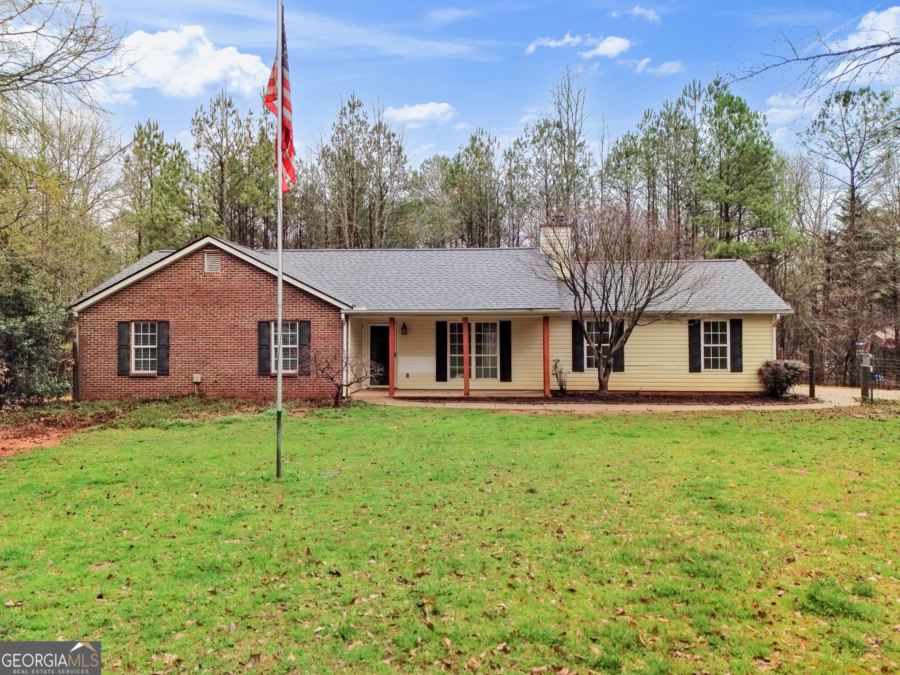 941 King Mill Road McDonough, GA 30252 - Photo 1 of 1 a front view of a house with garden