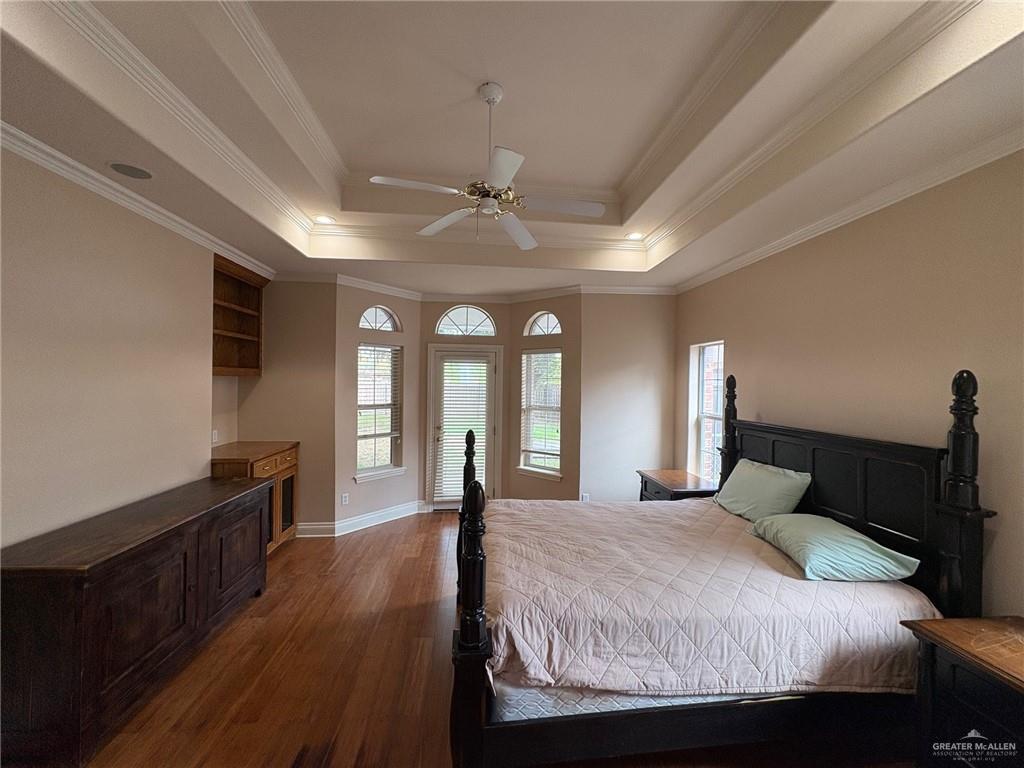 336 Toucan Avenue McAllen, TX 78504 - Photo 15 of 34 a bedroom with a large bed and a large window