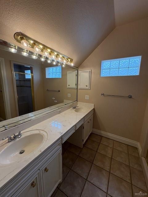 336 Toucan Avenue McAllen, TX 78504 - Photo 26 of 34 a bathroom with a sink and a mirror