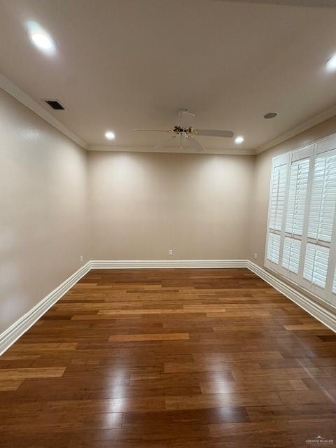 336 Toucan Avenue McAllen, TX 78504 - Photo 3 of 34 an empty room with wooden floor and windows