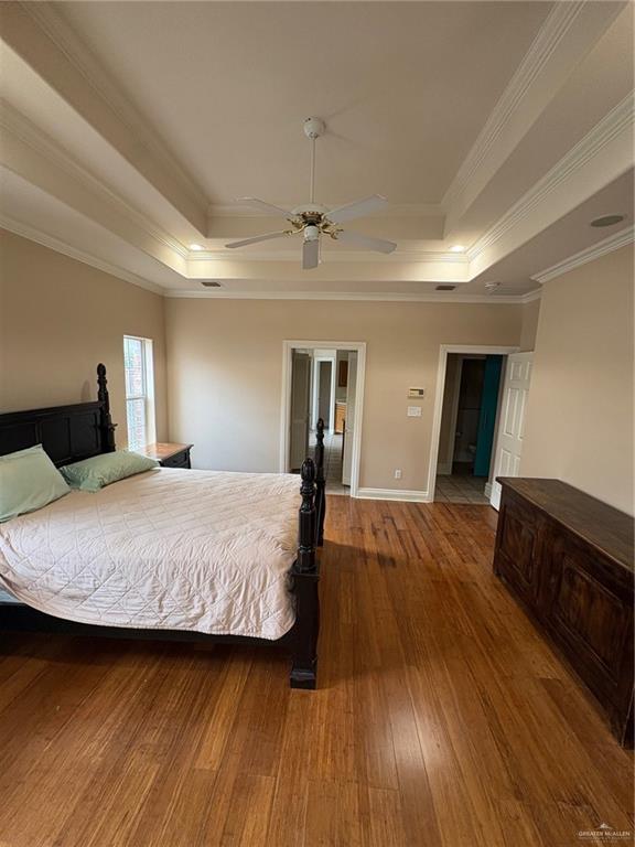 336 Toucan Avenue McAllen, TX 78504 - Photo 31 of 34 a bedroom with a bed and wooden floor