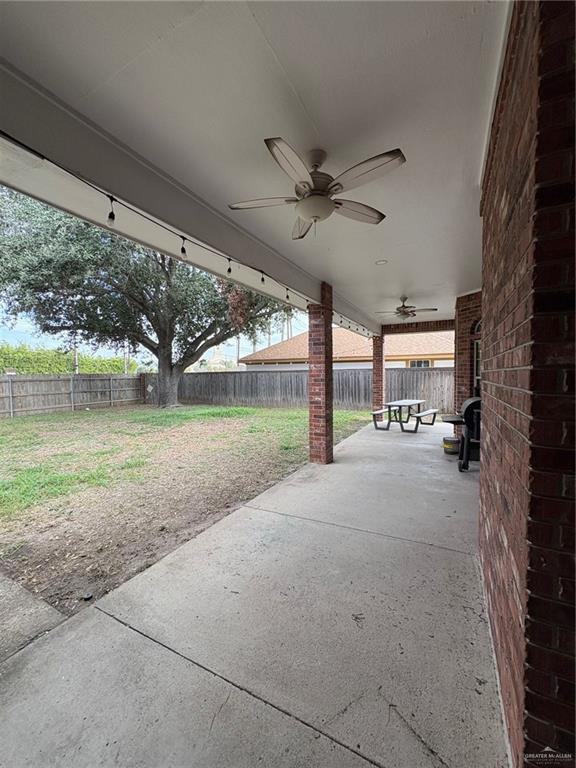 336 Toucan Avenue McAllen, TX 78504 - Photo 33 of 34 a view of a house with a yard and a garage