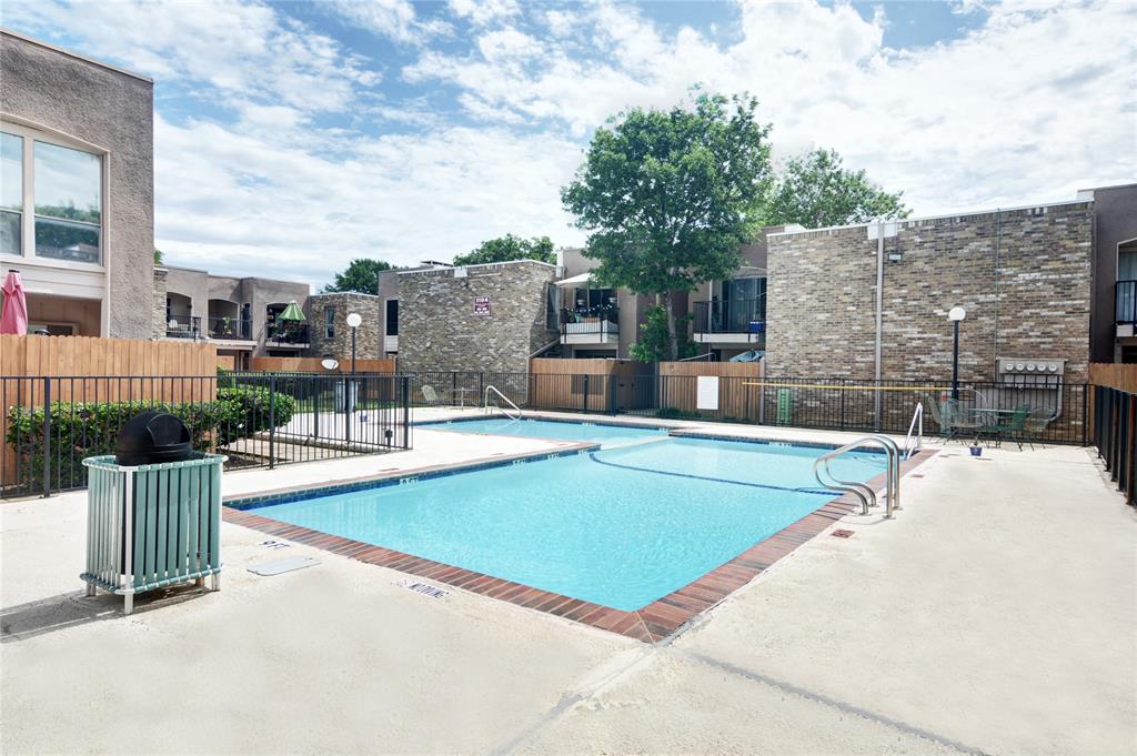 5514 Boca Raton Boulevard, Unit 438 Fort Worth, TX 76112 - Photo 24 of 25 a view of a house with swimming pool and sitting area