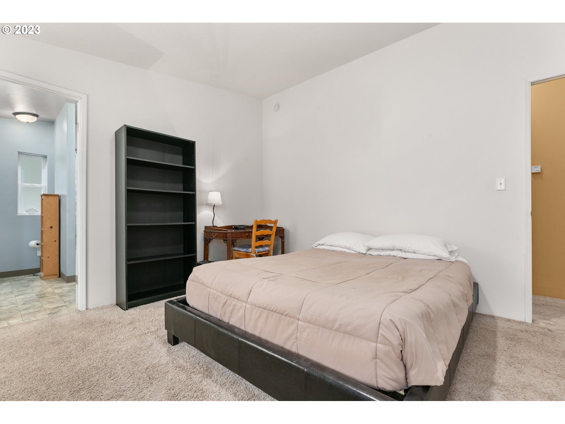 18 South Gee Creek Loop Ridgefield, WA 98642 - Photo 11 of 24 a bedroom with a bed and a cabinets