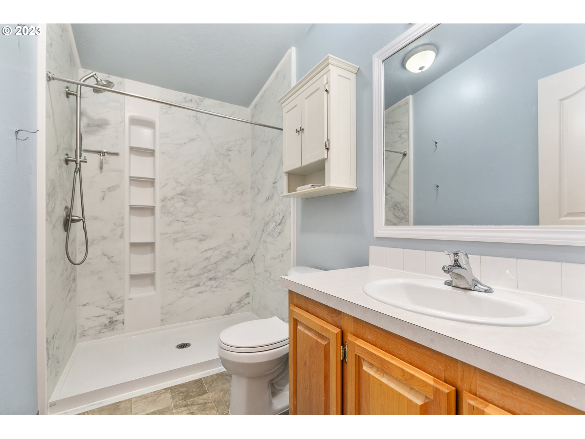 18 South Gee Creek Loop Ridgefield, WA 98642 - Photo 14 of 24 a bathroom with a sink shower and a toilet