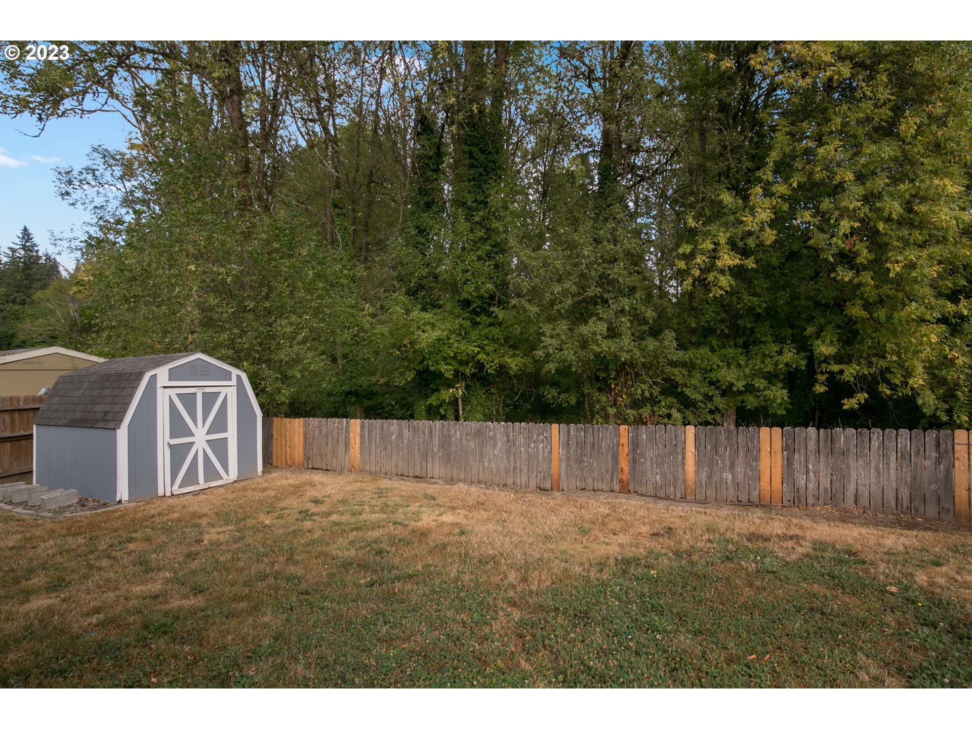 18 South Gee Creek Loop Ridgefield, WA 98642 - Photo 2 of 24 a view of a backyard
