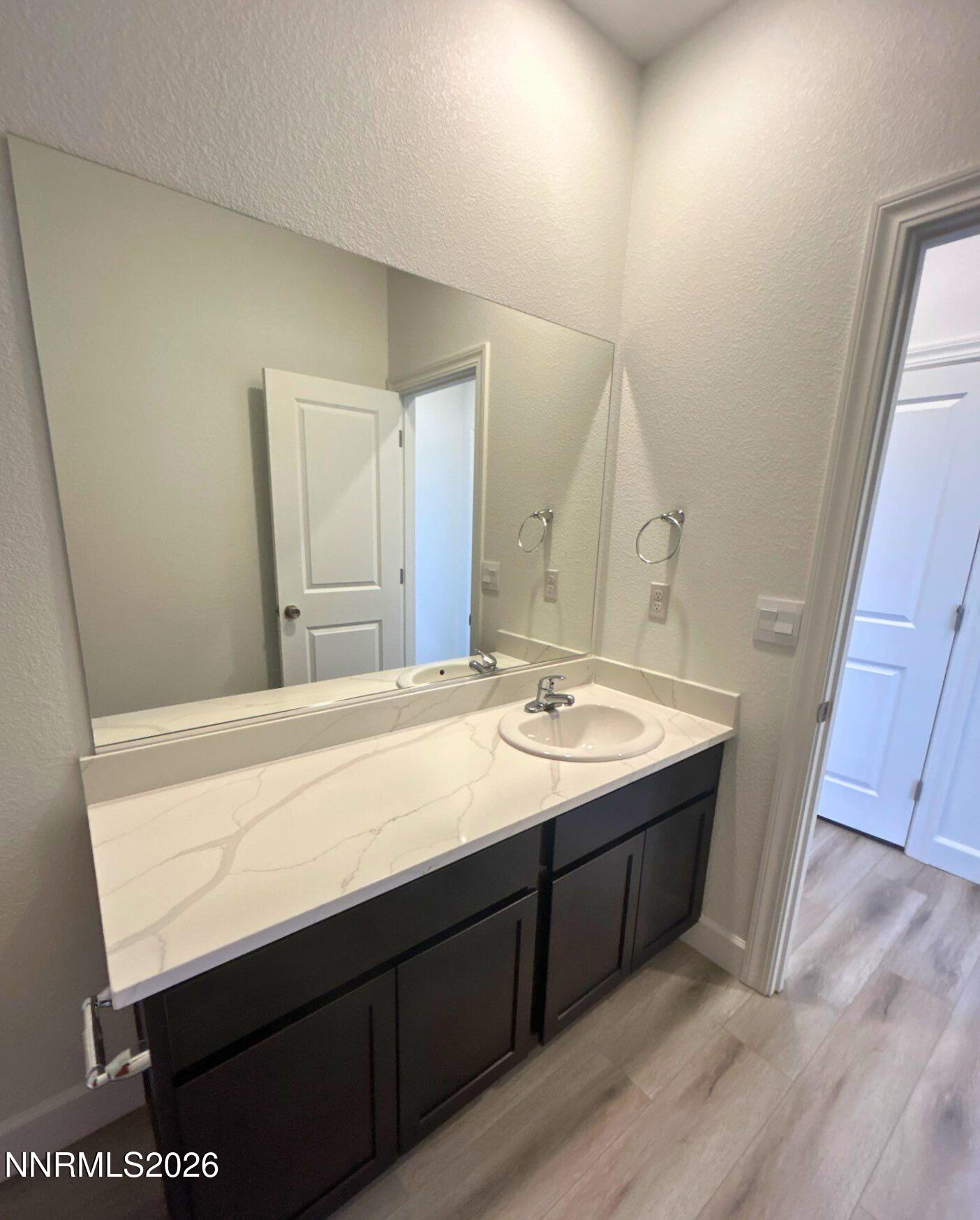 3453 Payton Way Fernley, NV 89408 - Photo 14 of 15 a bathroom with a sink and a mirror
