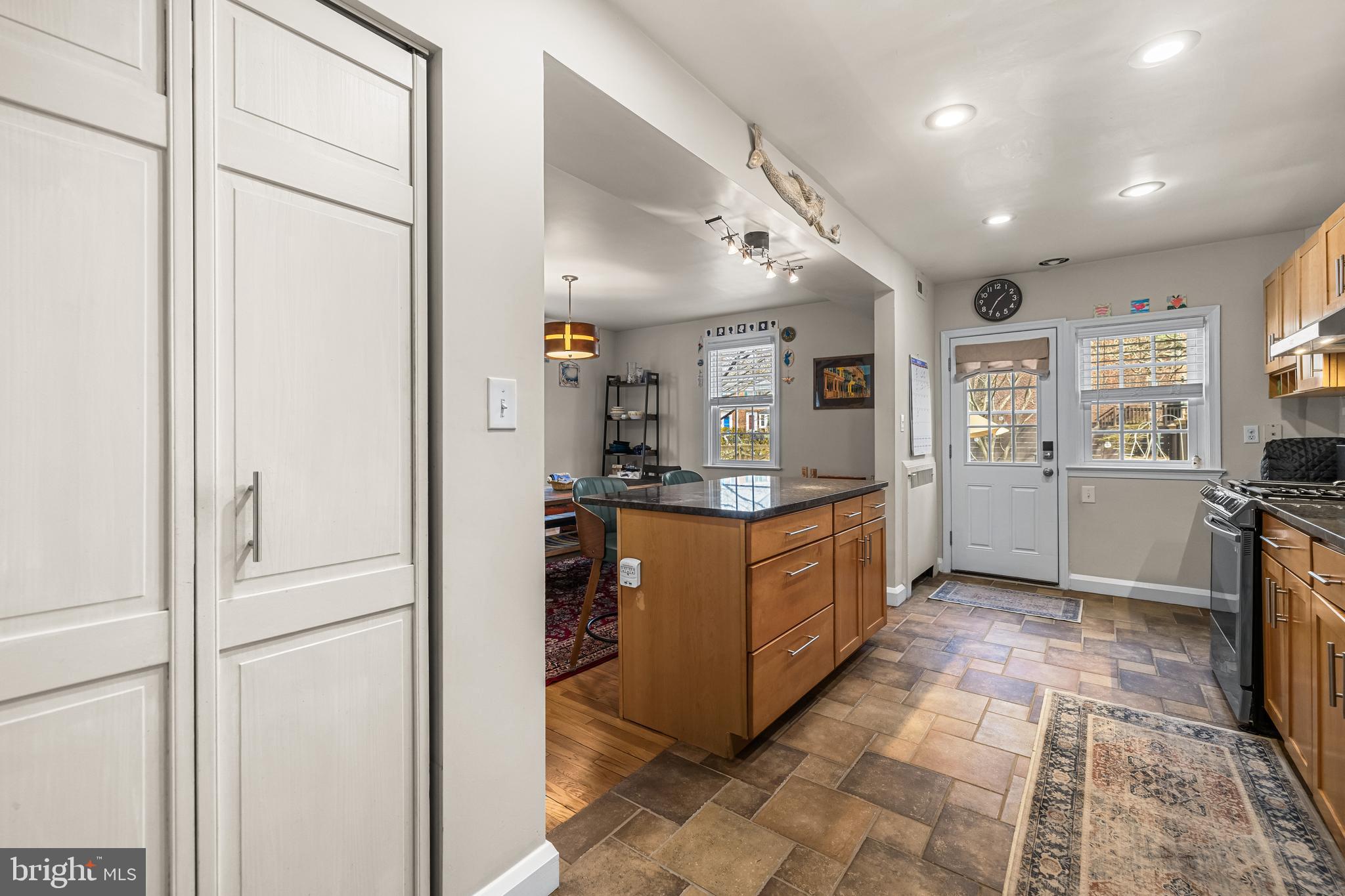 6447 Blenheim Road Baltimore, MD 21212 - Photo 11 of 51 a kitchen with stainless steel appliances granite countertop a refrigerator and a sink