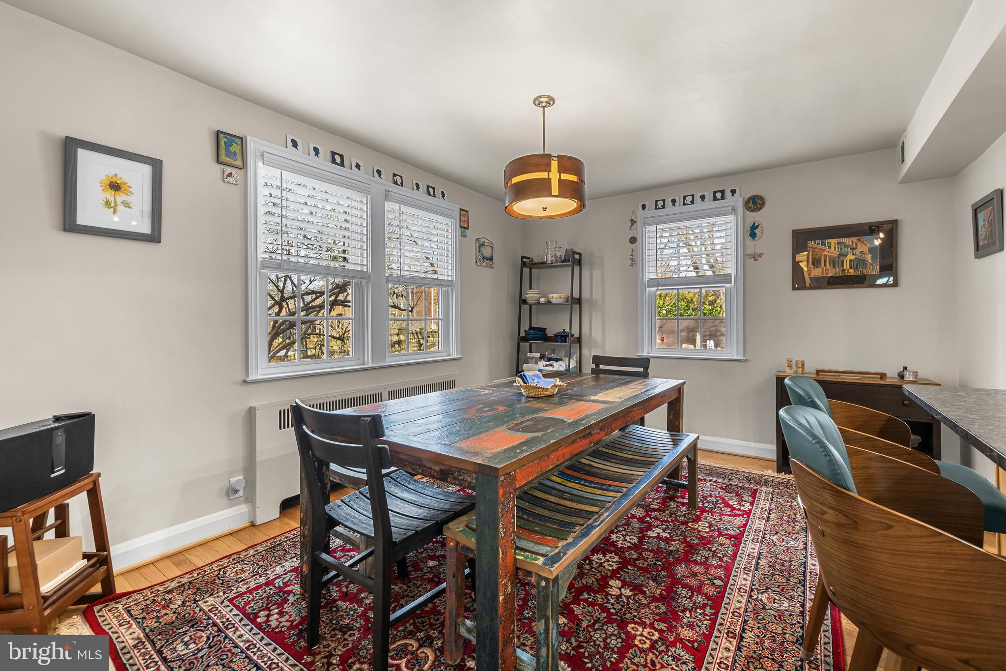 6447 Blenheim Road Baltimore, MD 21212 - Photo 18 of 51 a view of a dining room with furniture window and wooden floor
