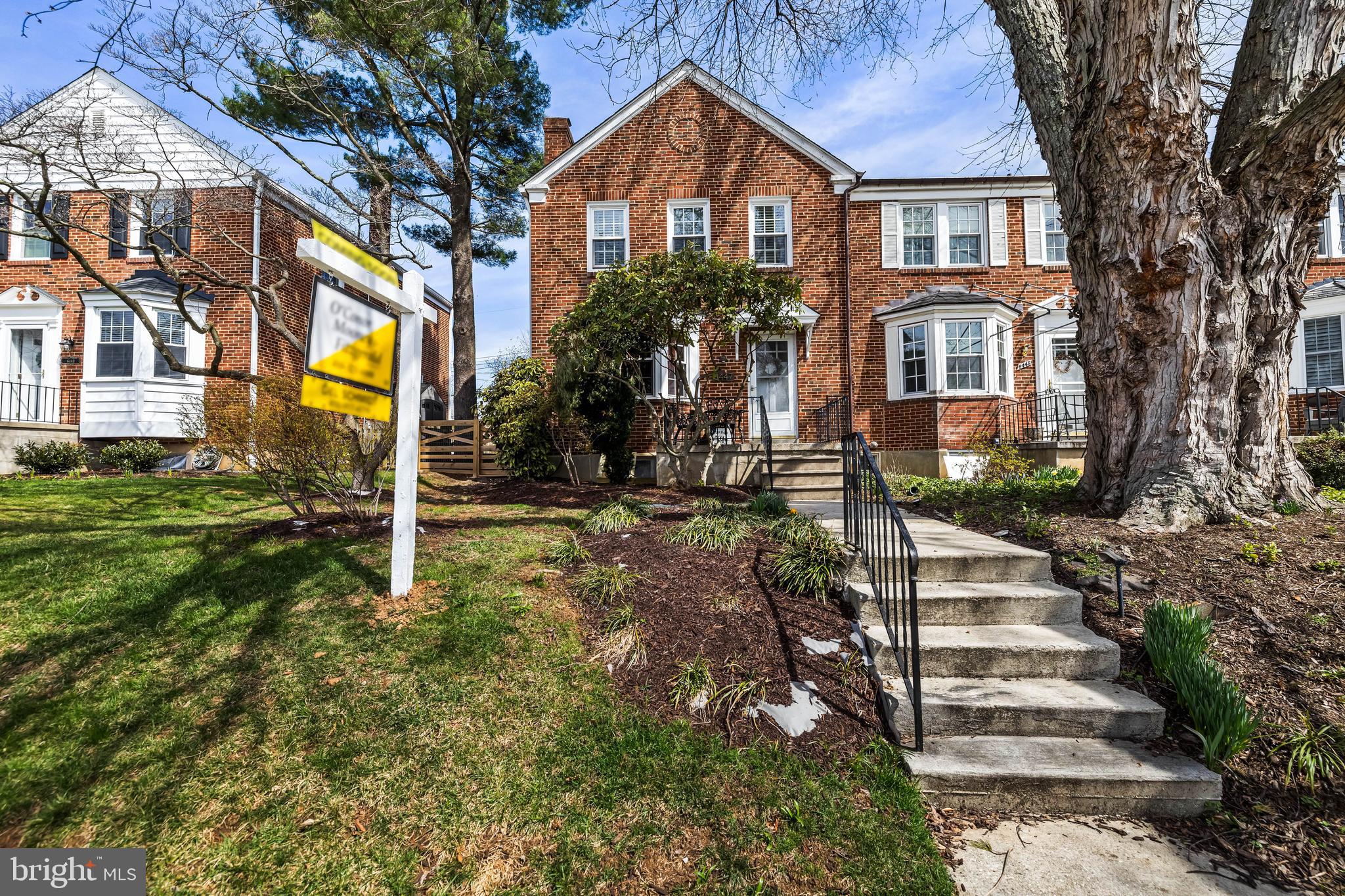 6447 Blenheim Road Baltimore, MD 21212 - Photo 3 of 51 a front view of a house with a yard