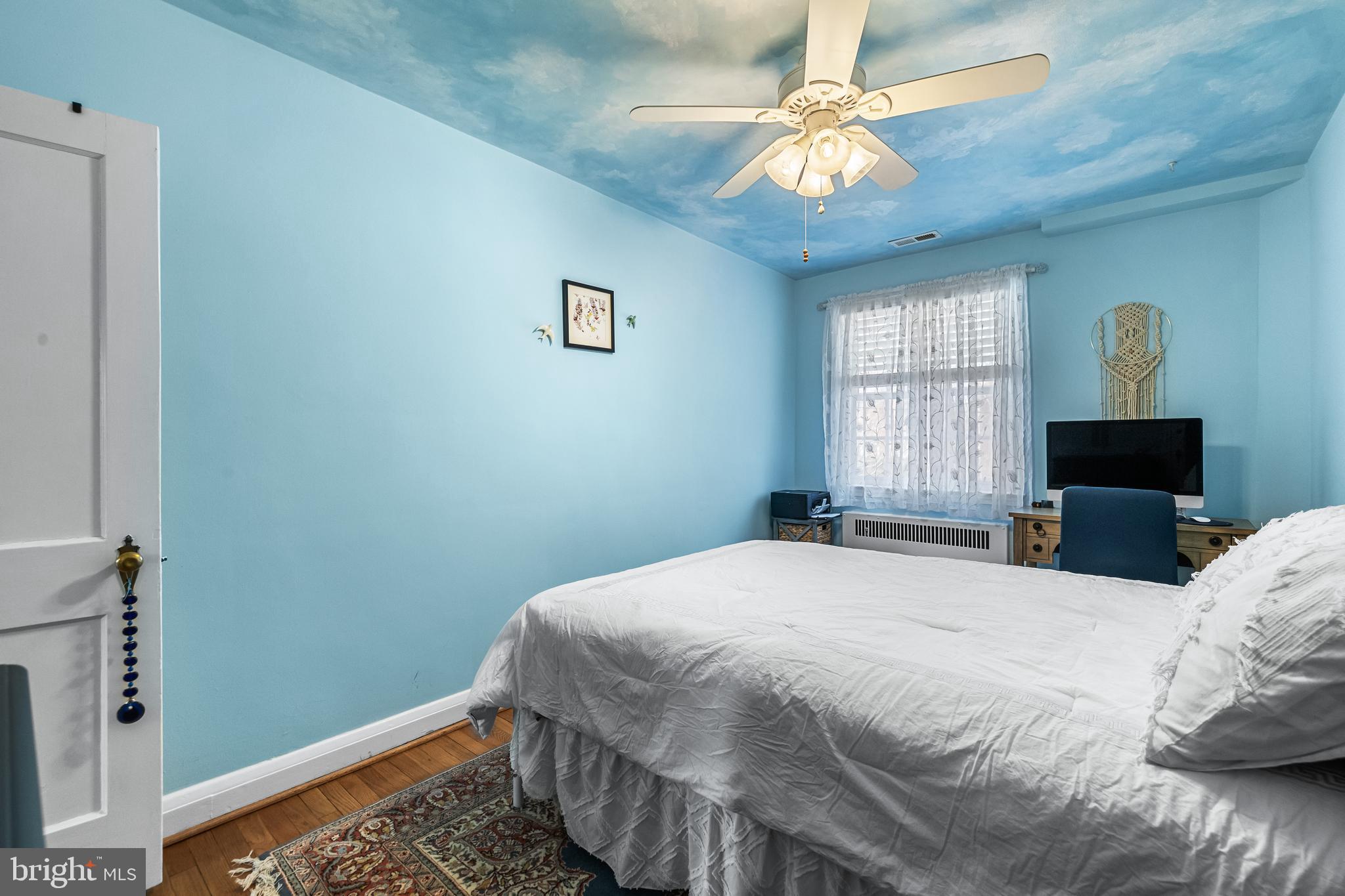 6447 Blenheim Road Baltimore, MD 21212 - Photo 32 of 51 a bedroom with a bed and a window