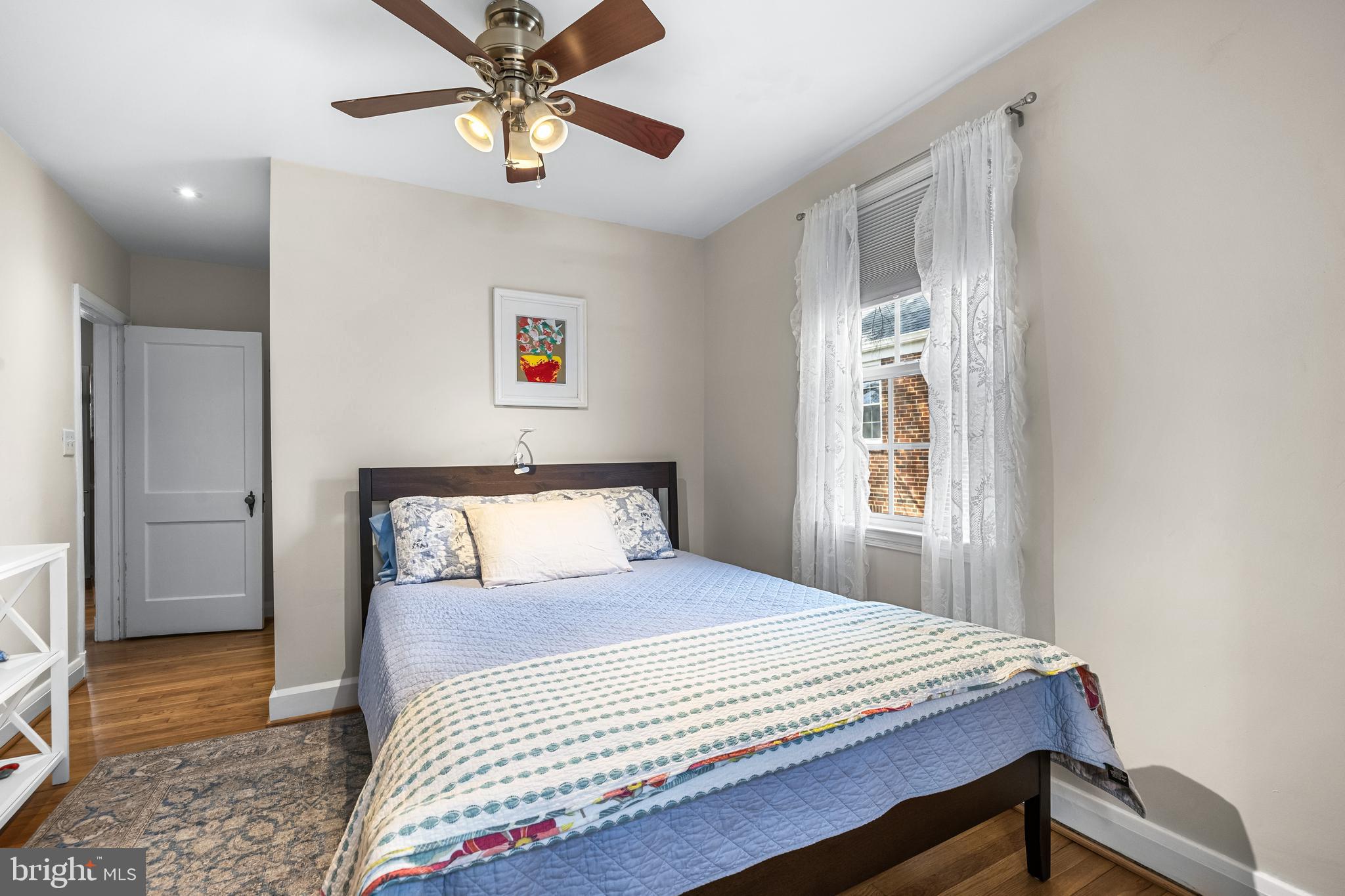 6447 Blenheim Road Baltimore, MD 21212 - Photo 37 of 51 a bedroom with a bed and a window