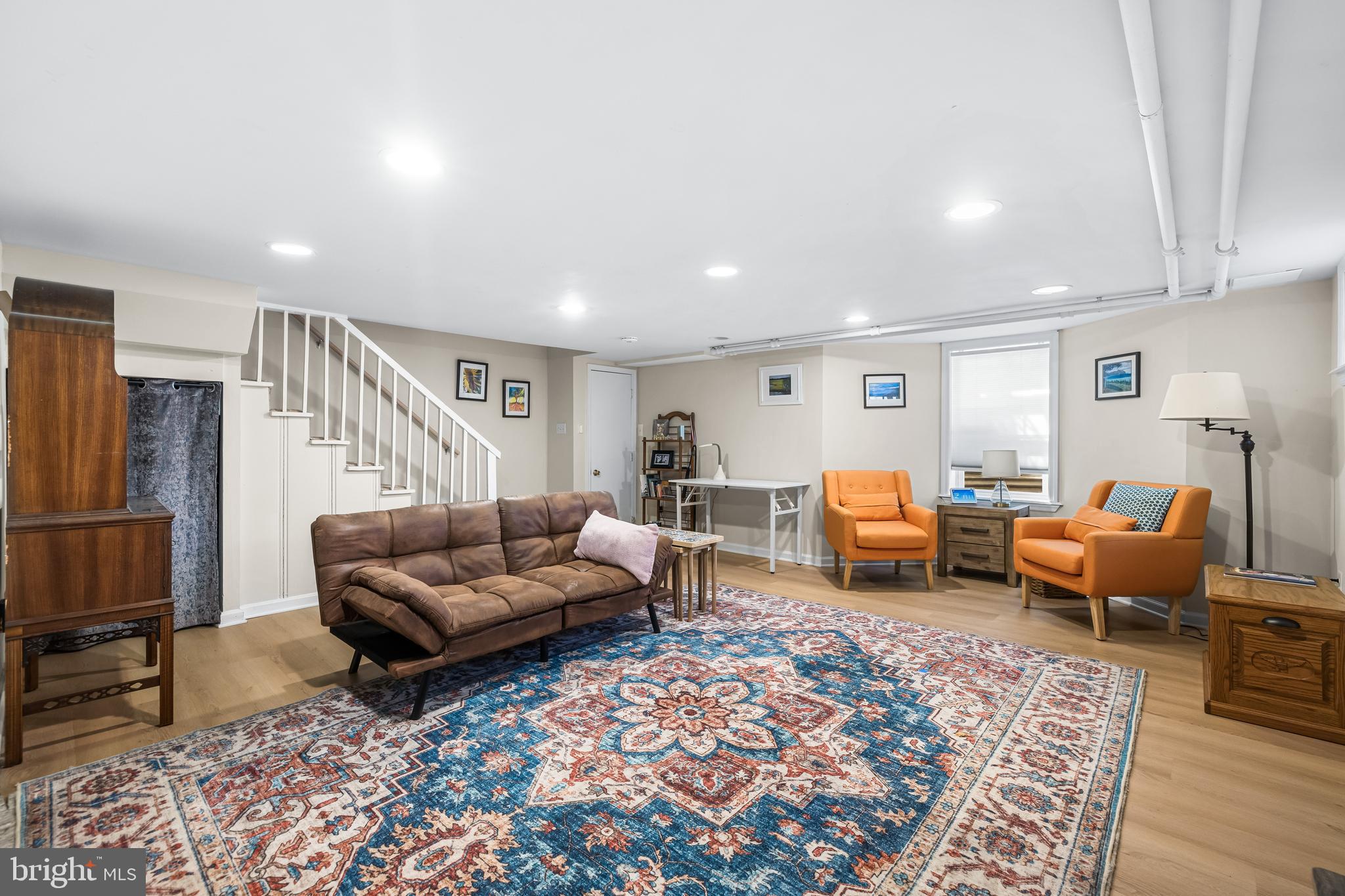 6447 Blenheim Road Baltimore, MD 21212 - Photo 44 of 51 a living room with furniture and a rug