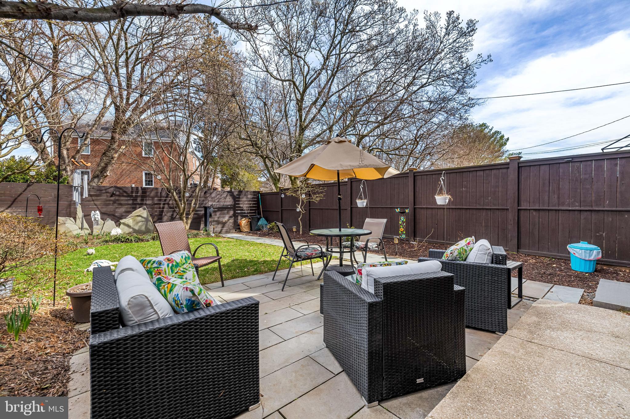 6447 Blenheim Road Baltimore, MD 21212 - Photo 46 of 51 a view of a patio with couches chairs and a fire pit
