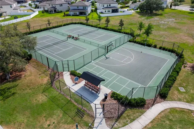 an aerial view of a house with a garden