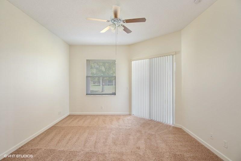 549 Southwest Aster Road Port St. Lucie, FL 34953 - Photo 7 of 12 08_549SWAsterRoad_14_MasterBedroom_FlexM