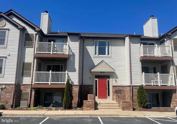 a front view of a house with a garage