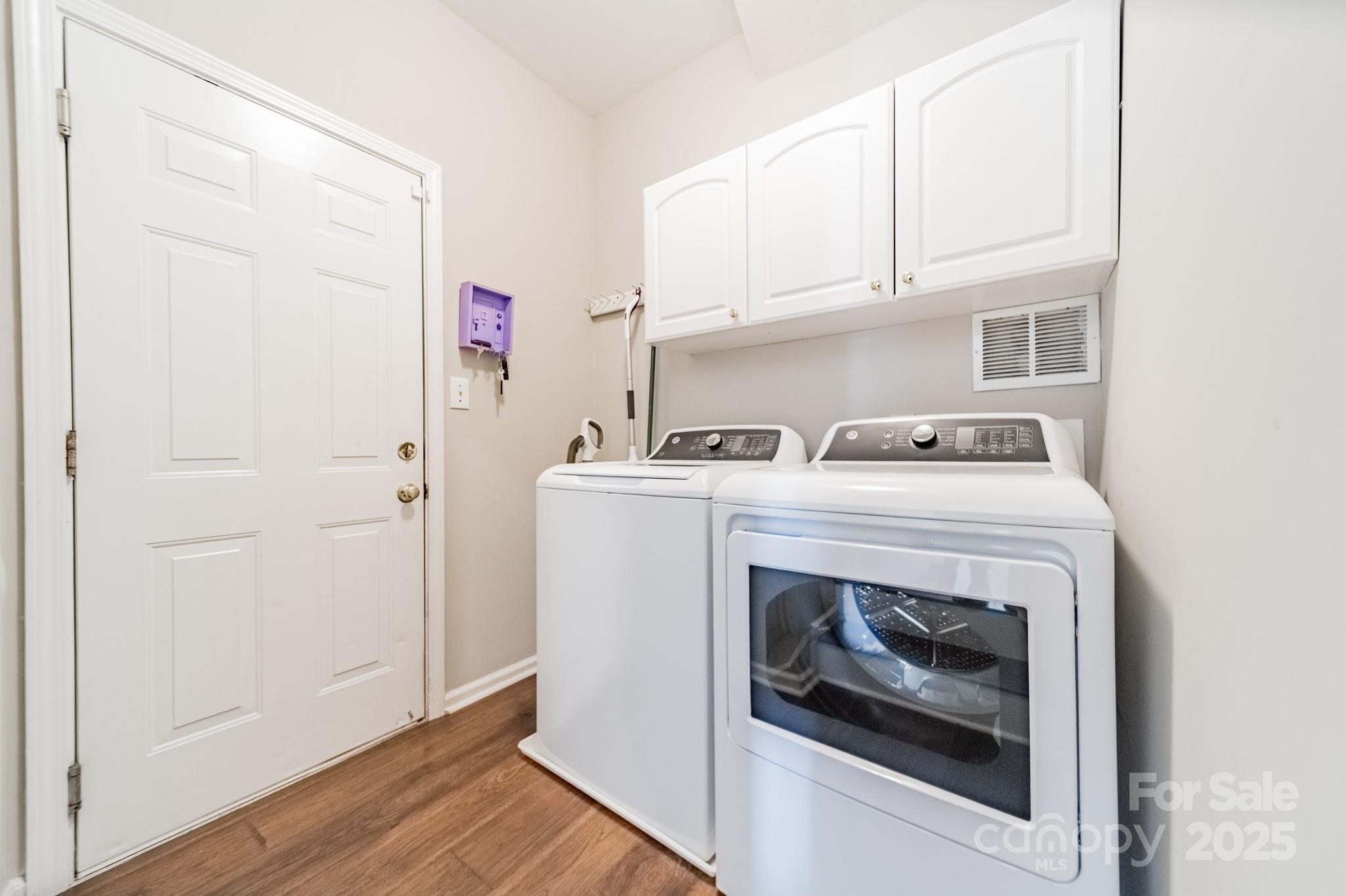 16104 Hollingbourne Road Huntersville, NC 28078 - Photo 15 of 40 a utility room with dryer and washer