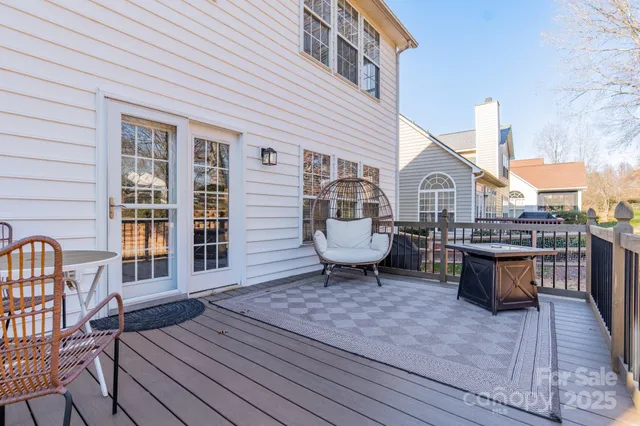 a view of a house with sitting area and wooden floor