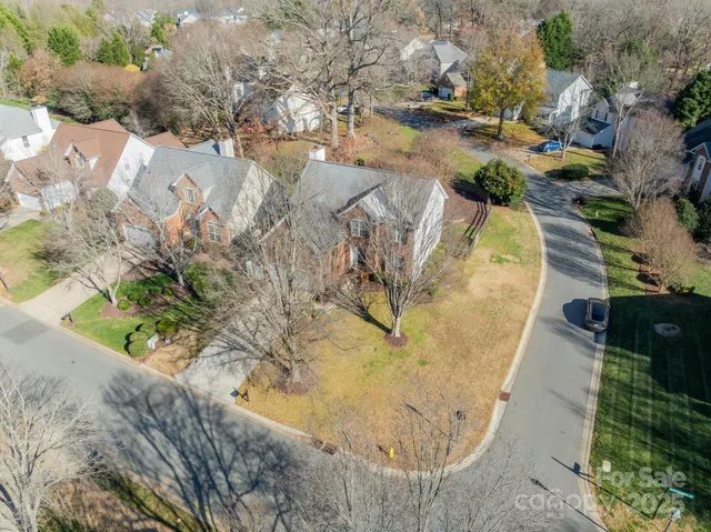 a view of swimming pool with a yard