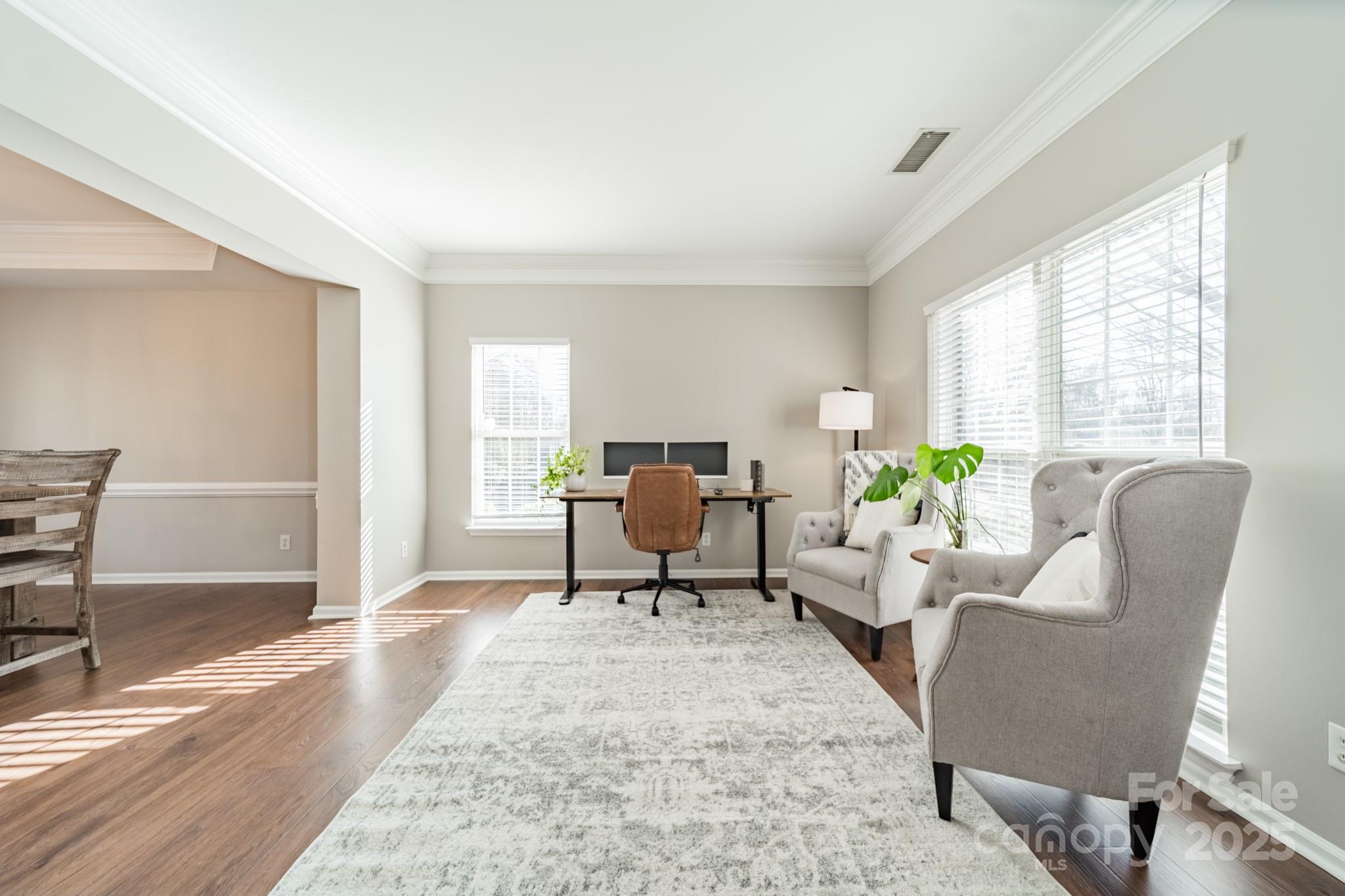 16104 Hollingbourne Road Huntersville, NC 28078 - Photo 7 of 40 a living room with furniture and wooden floor