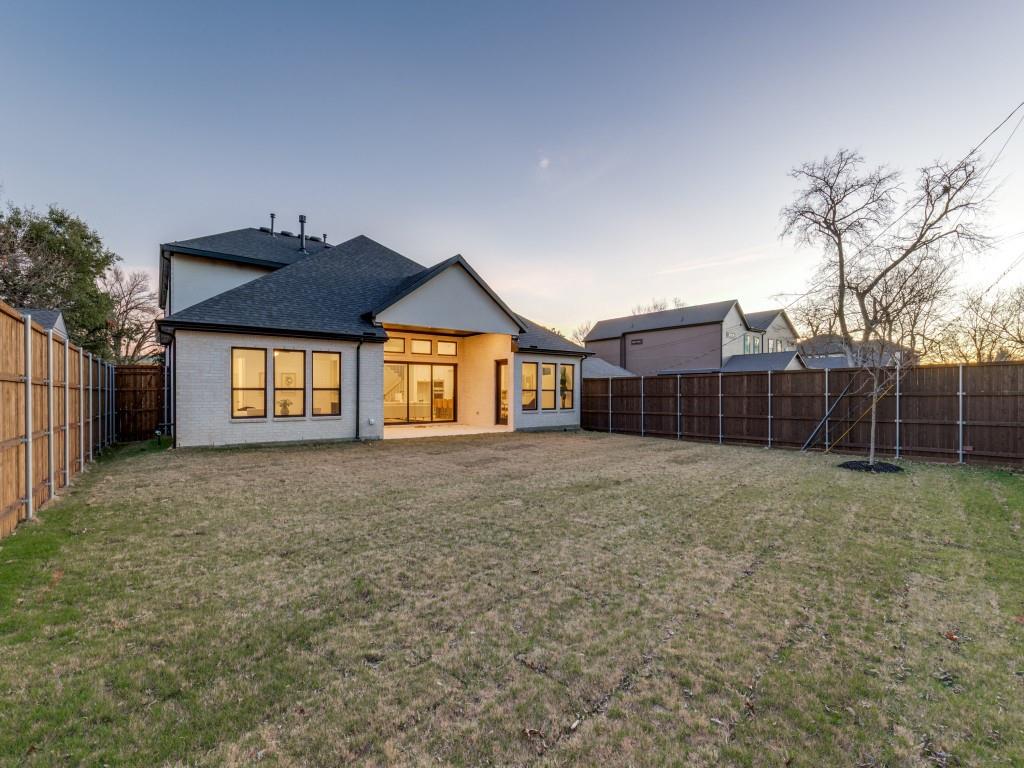 3849 Hawick Lane Dallas, TX 75220 - Photo 17 of 18 Back of house featuring a patio and a large, fenced backyard
