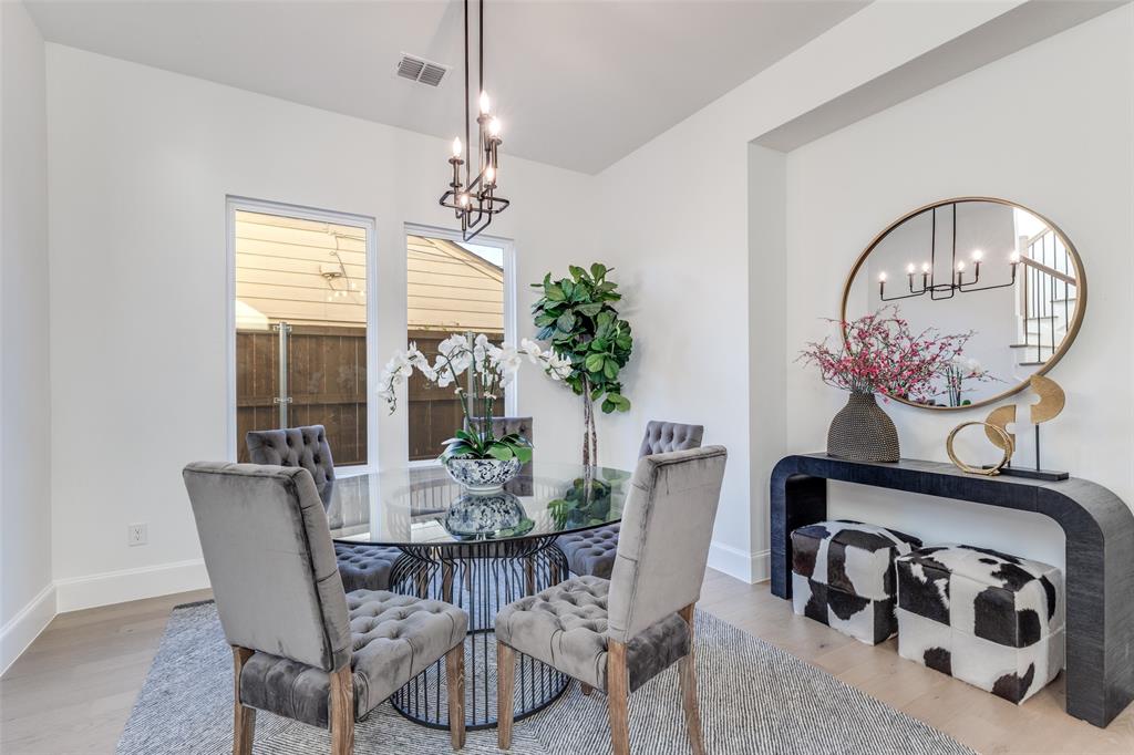 3849 Hawick Lane Dallas, TX 75220 - Photo 4 of 18 Breakfast/Dining area featuring a chandelier and light wood-style flooring