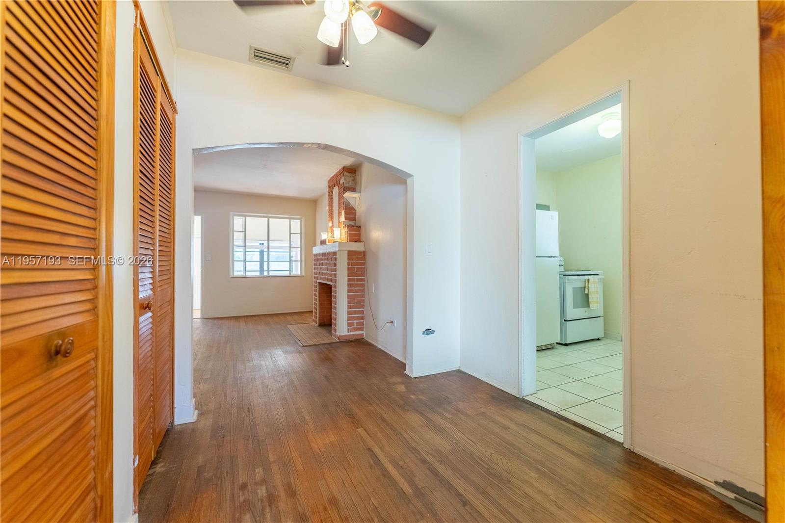 4381 Southwest 5th Terrace Miami, FL 33134 - Photo 14 of 34 wooden floor in a room with a window