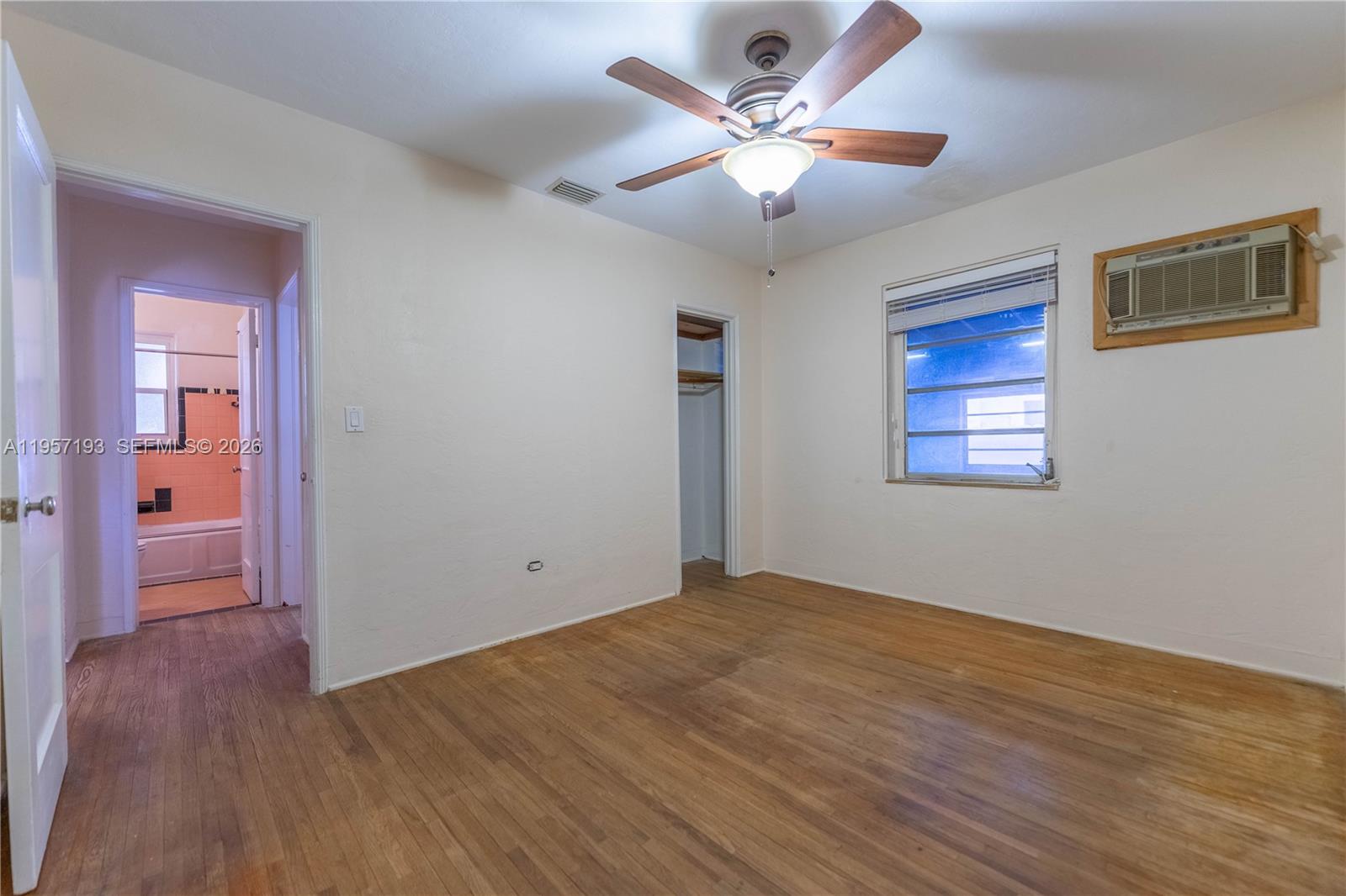 4381 Southwest 5th Terrace Miami, FL 33134 - Photo 16 of 34 a view of an empty room with wooden floor