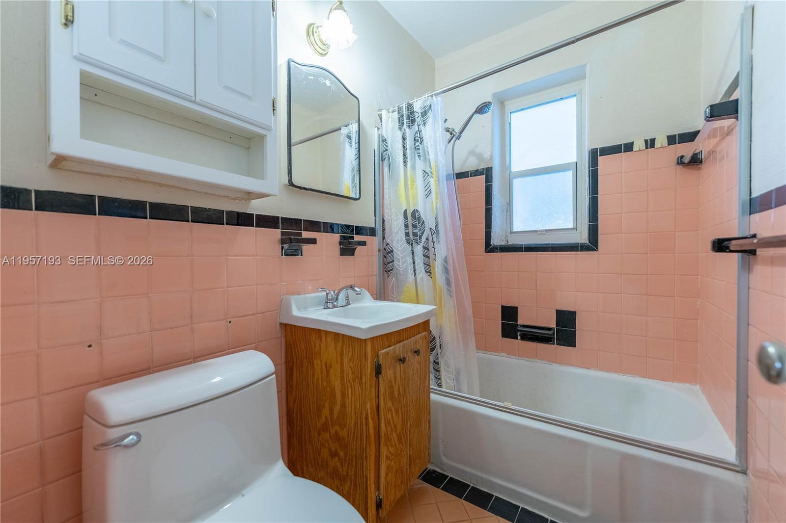 4381 Southwest 5th Terrace Miami, FL 33134 - Photo 17 of 34 a bathroom with a sink a toilet and shower