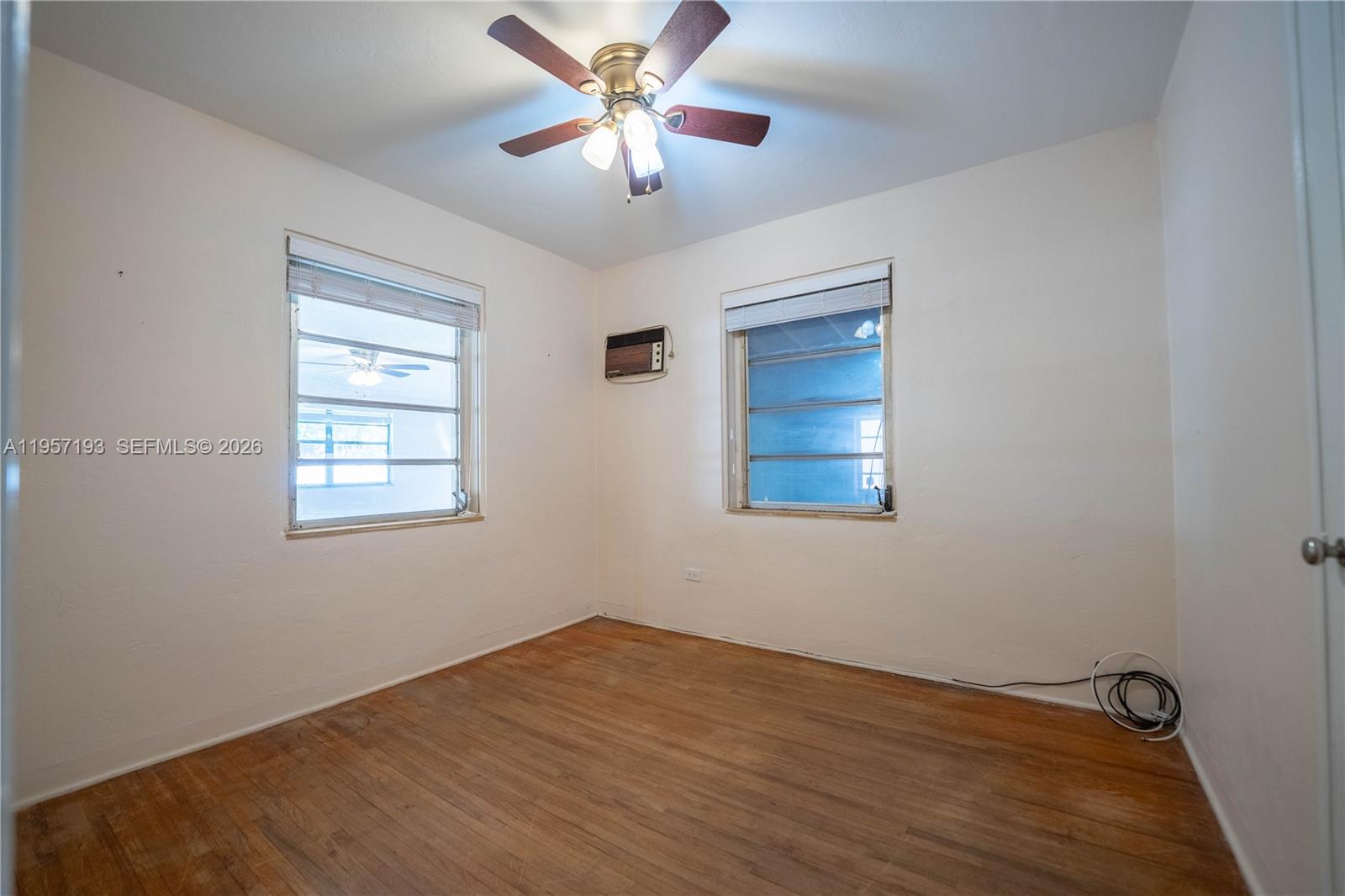 4381 Southwest 5th Terrace Miami, FL 33134 - Photo 19 of 34 a view of an empty room with a window and closet