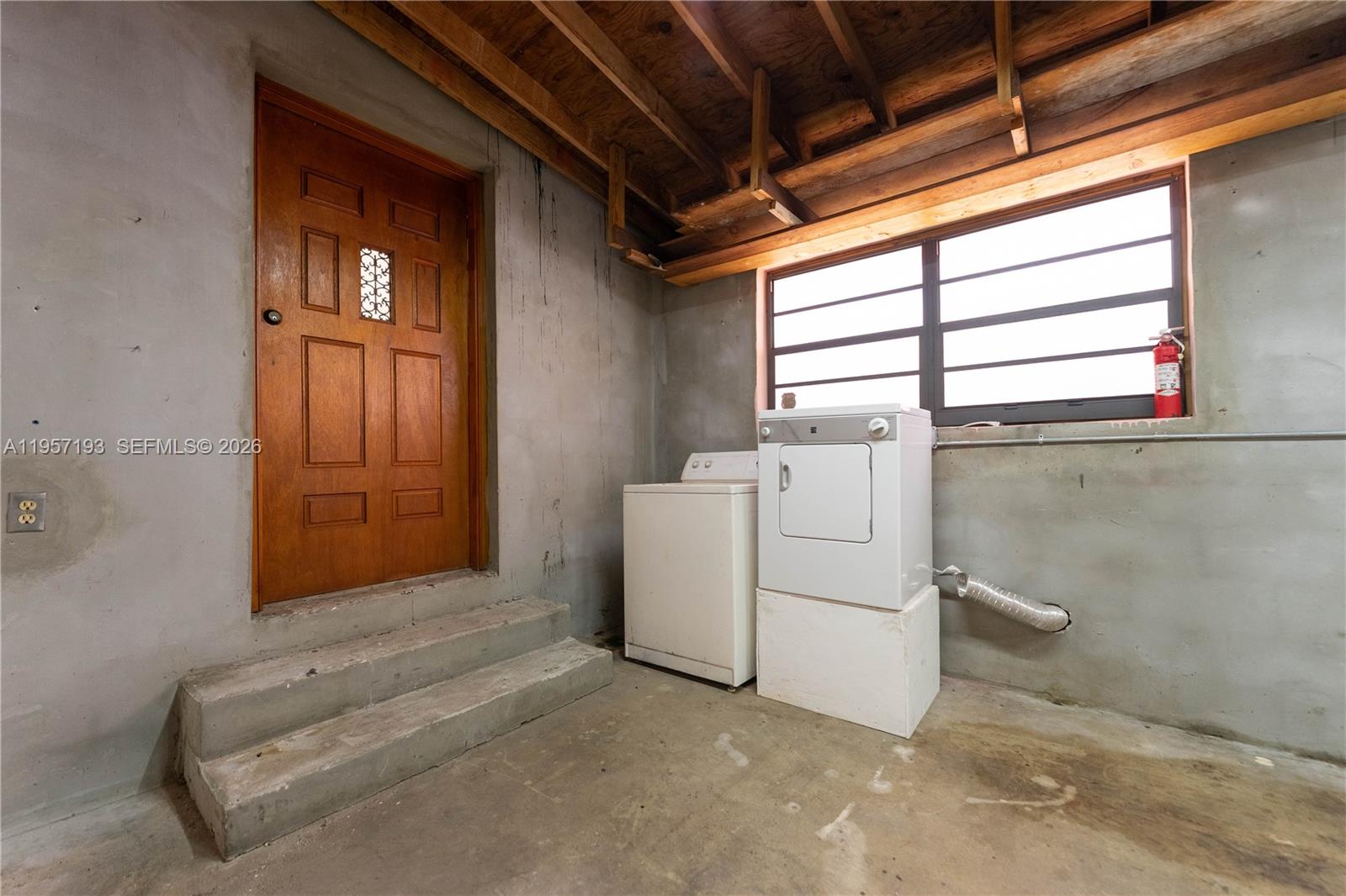 4381 Southwest 5th Terrace Miami, FL 33134 - Photo 20 of 34 a utility room with dryer and washer