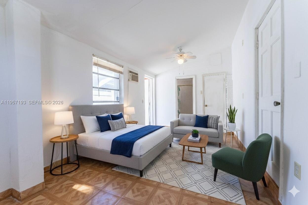 4381 Southwest 5th Terrace Miami, FL 33134 - Photo 25 of 34 a bedroom with a bed and a chair