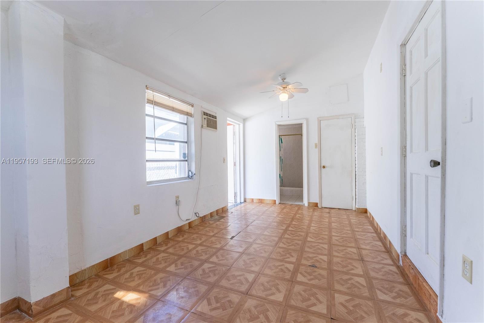 4381 Southwest 5th Terrace Miami, FL 33134 - Photo 26 of 34 a view of empty room with windows