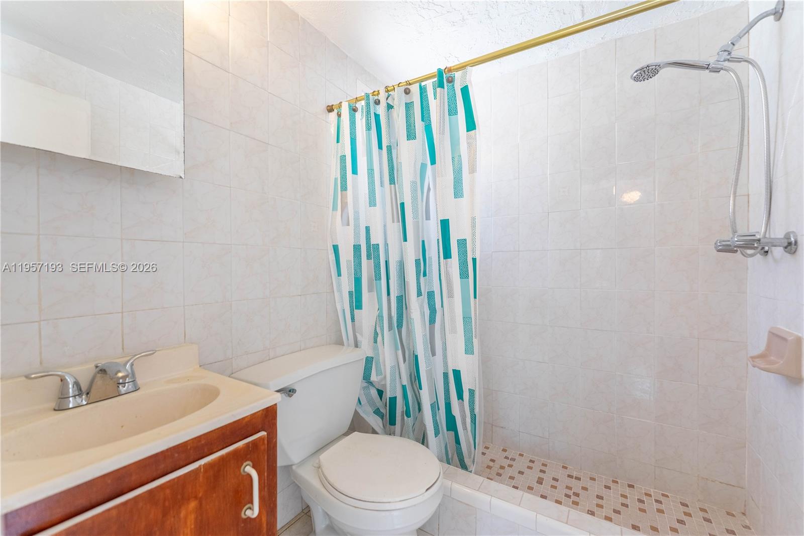 4381 Southwest 5th Terrace Miami, FL 33134 - Photo 27 of 34 a bathroom with a sink a toilet and shower