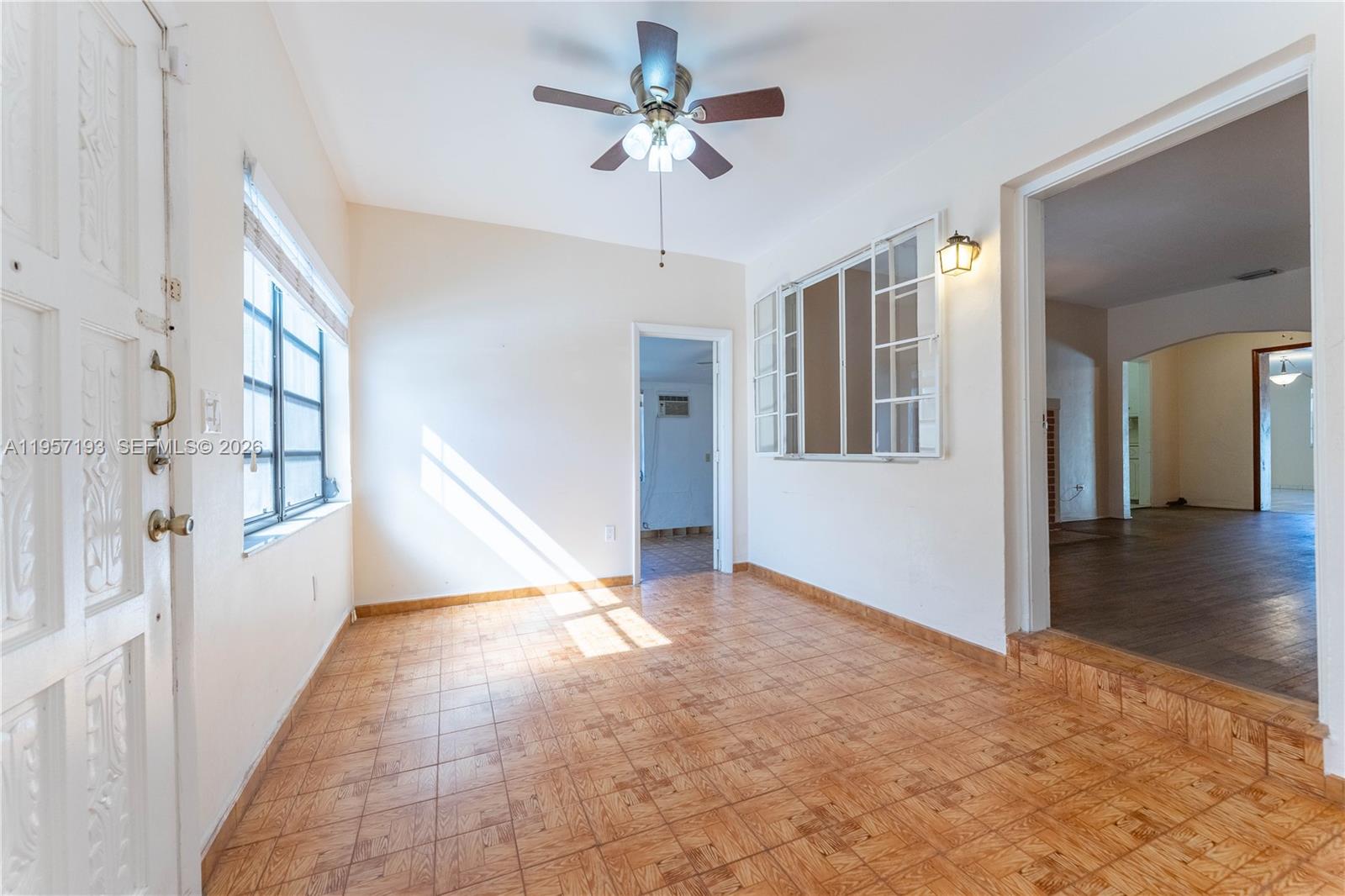 4381 Southwest 5th Terrace Miami, FL 33134 - Photo 4 of 34 a view of an empty room with a window