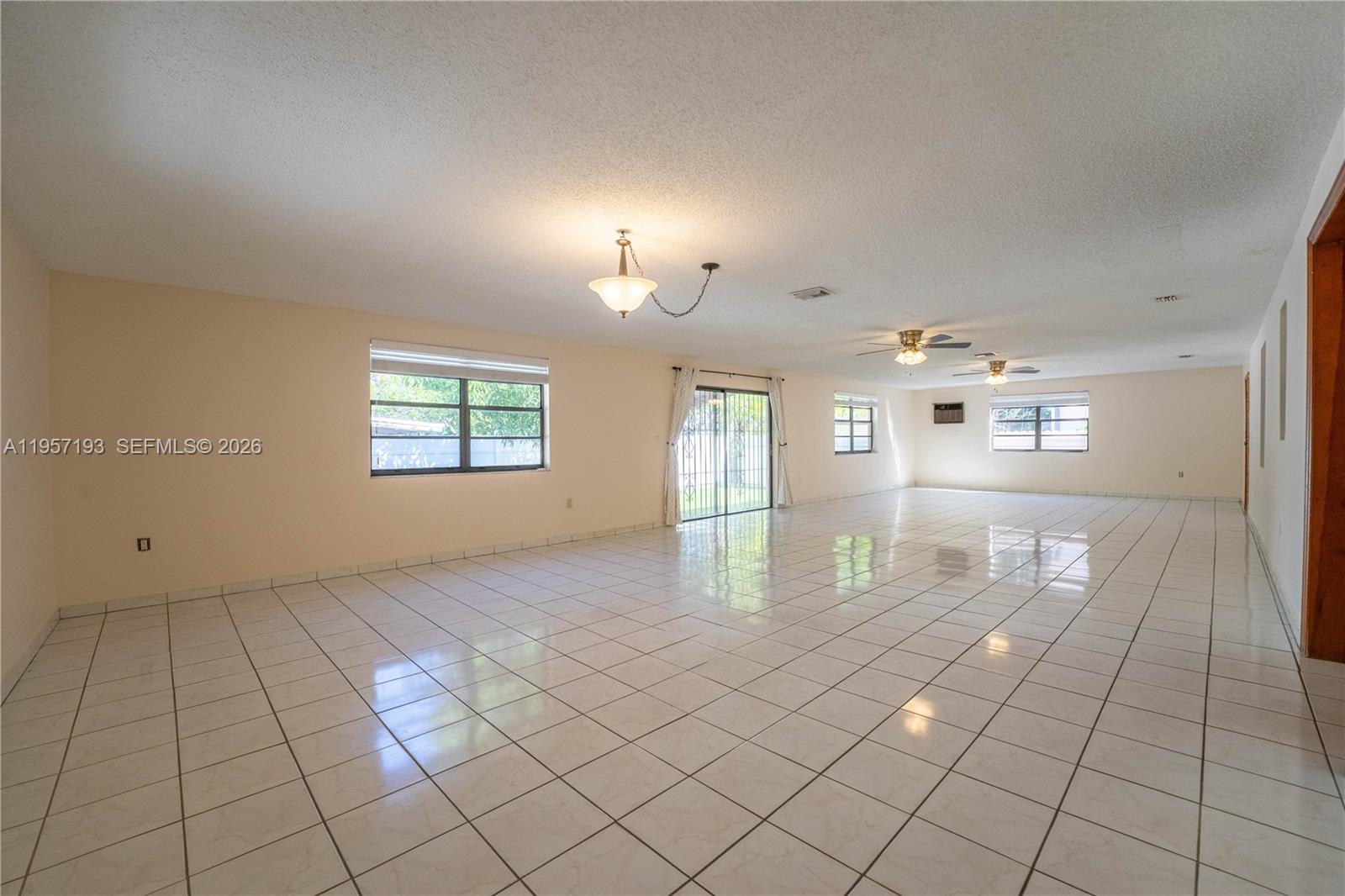 4381 Southwest 5th Terrace Miami, FL 33134 - Photo 8 of 34 a view of an empty room and window