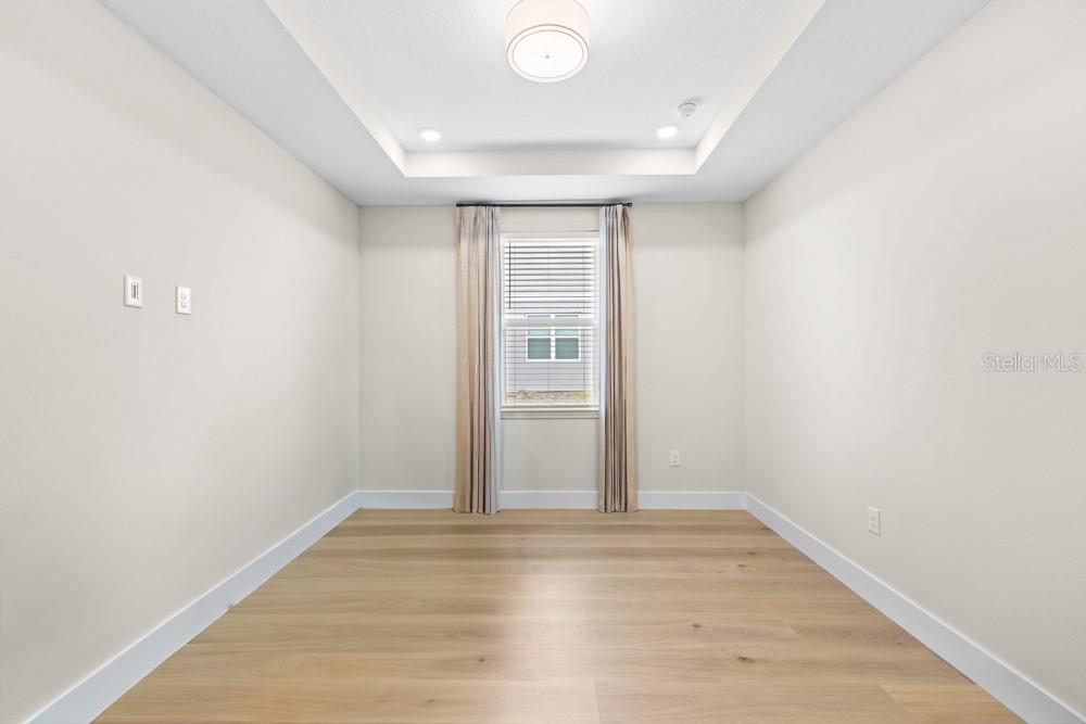 5148 Foothills Preserve Loop Mount Dora, FL 32757 - Photo 23 of 54 a view of an empty room
