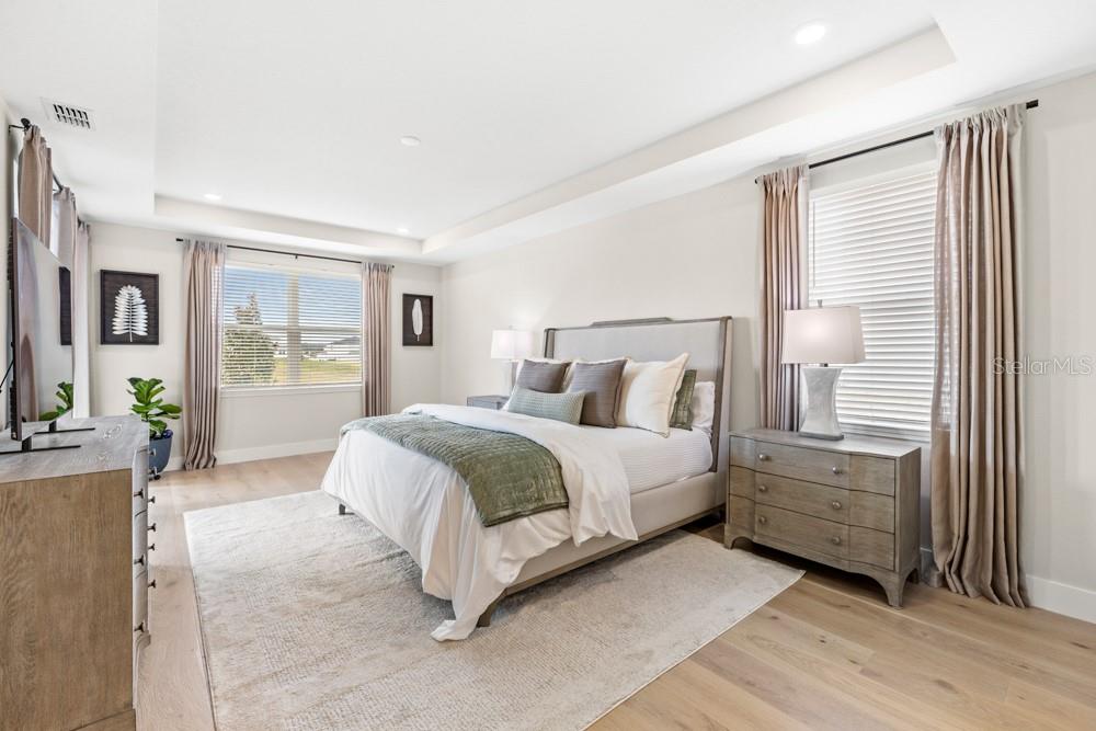 5148 Foothills Preserve Loop Mount Dora, FL 32757 - Photo 24 of 54 a bedroom with a bed and a window