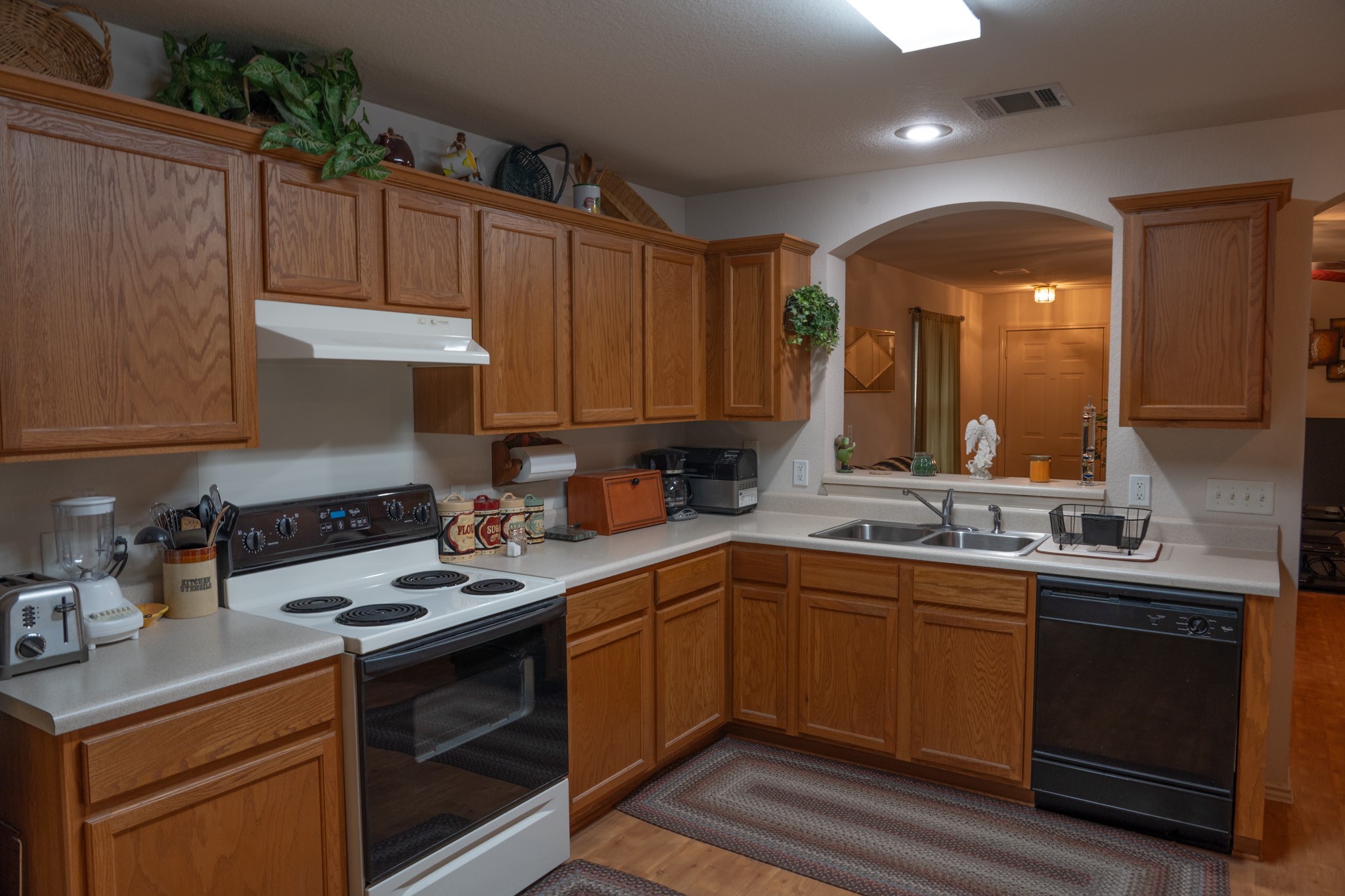 812 Battenburg Trail Pflugerville, TX 78660 - Photo 3 of 29 The kitchen's blend of functionality with effortless charm creates warmth and an inviting atmosphere.