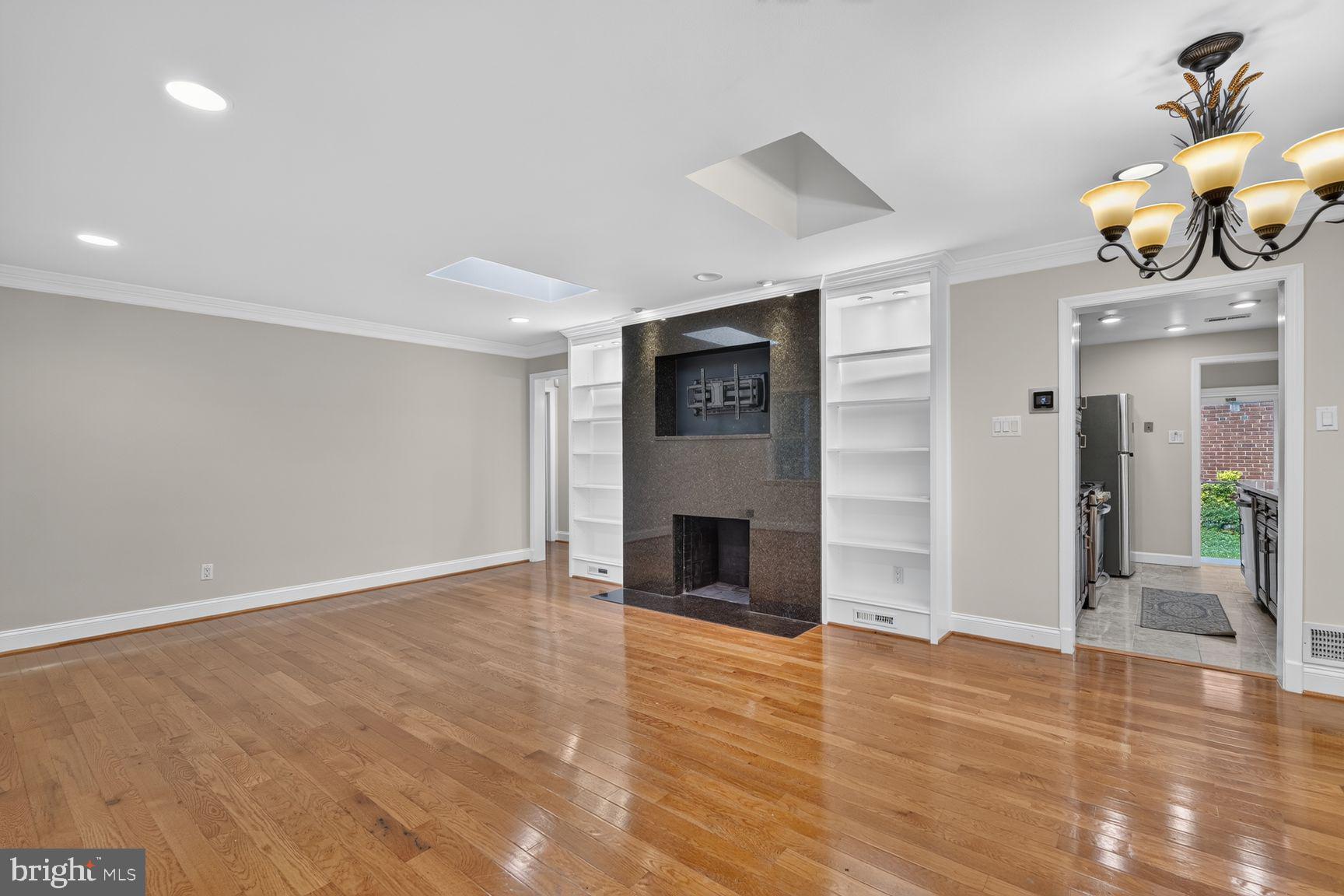 1813 Florin Street Silver Spring, MD 20902 - Photo 3 of 22 CUSTOM BUILT IN SHELVES