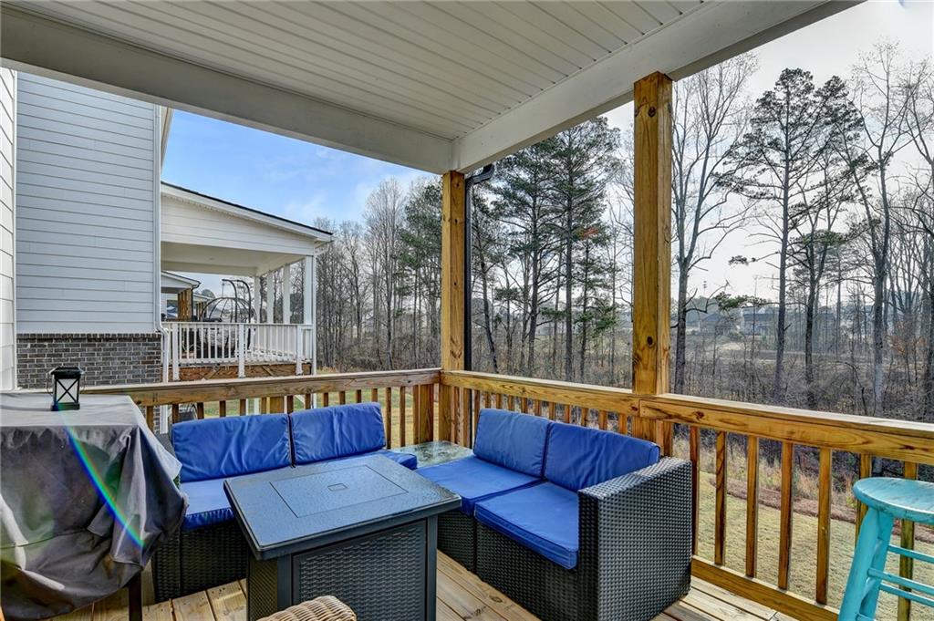 86 Canyon Ferry Way Hoschton, GA 30548 - Photo 46 of 61 a view of a two chairs in the balcony