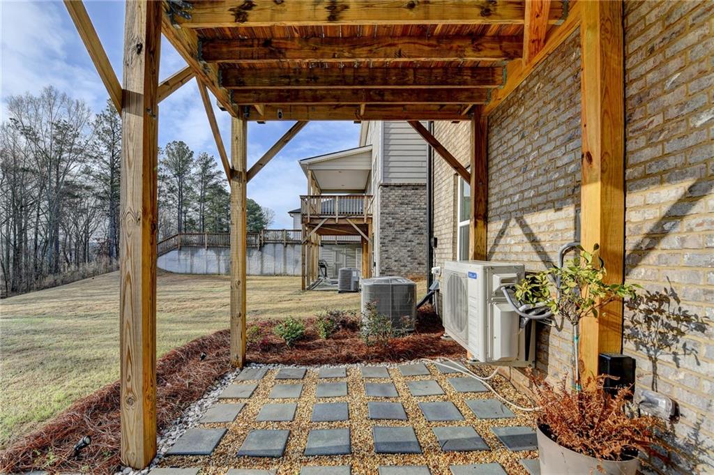 86 Canyon Ferry Way Hoschton, GA 30548 - Photo 49 of 61 a view of house with a outdoor space