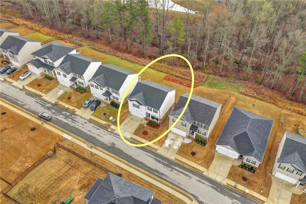 86 Canyon Ferry Way Hoschton, GA 30548 - Photo 61 of 61 a view of a swimming pool with a lounge chairs