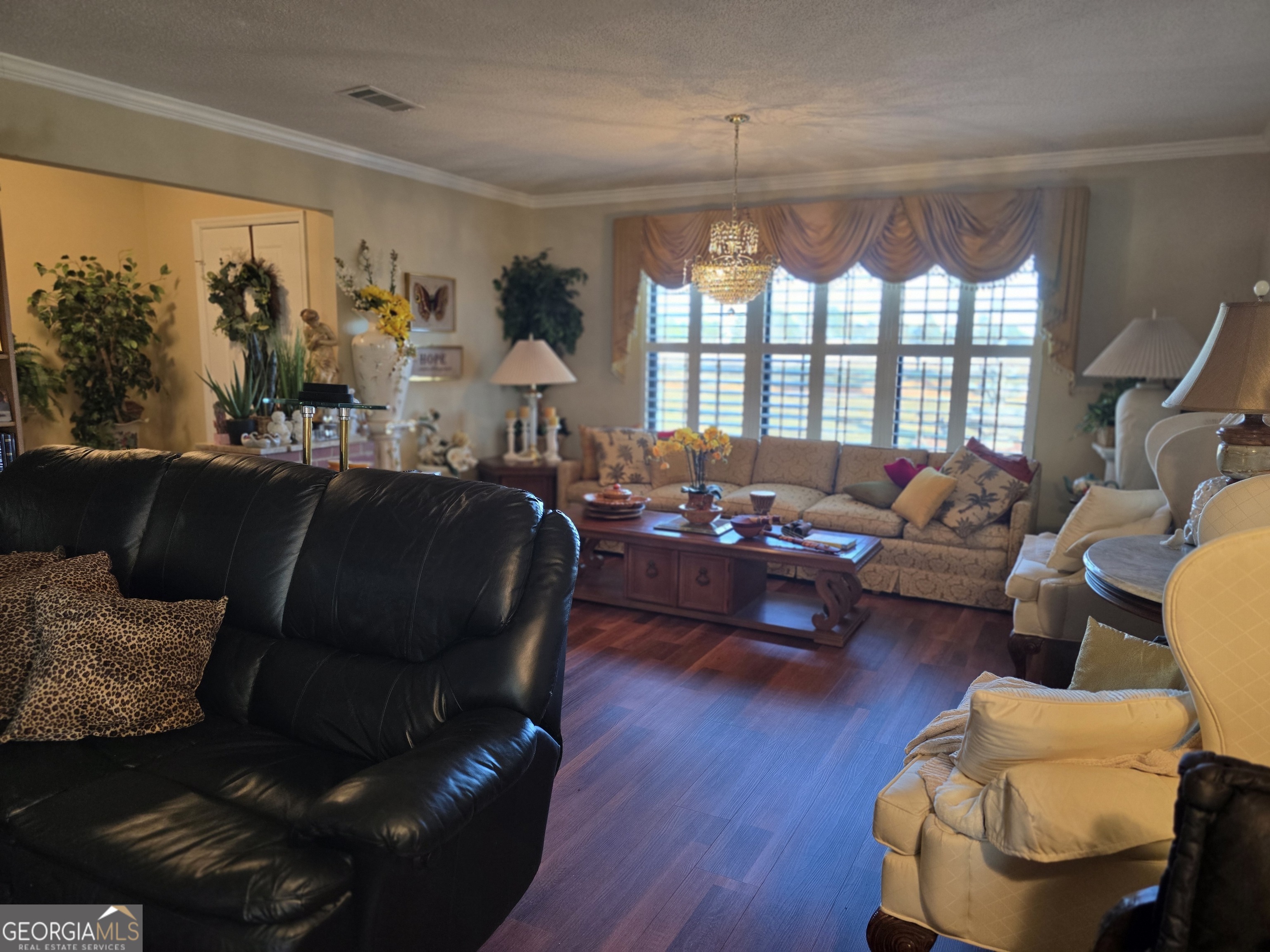 479 Mitchell Loop Bluffton, GA 39824 - Photo 20 of 51 a living room with furniture and a large window