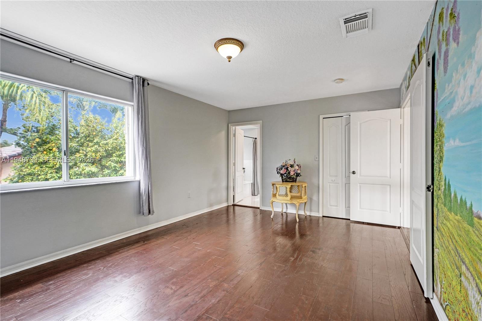 5502 Southwest 162nd Place Miami, FL 33185 - Photo 32 of 72 a view of an empty room with a window
