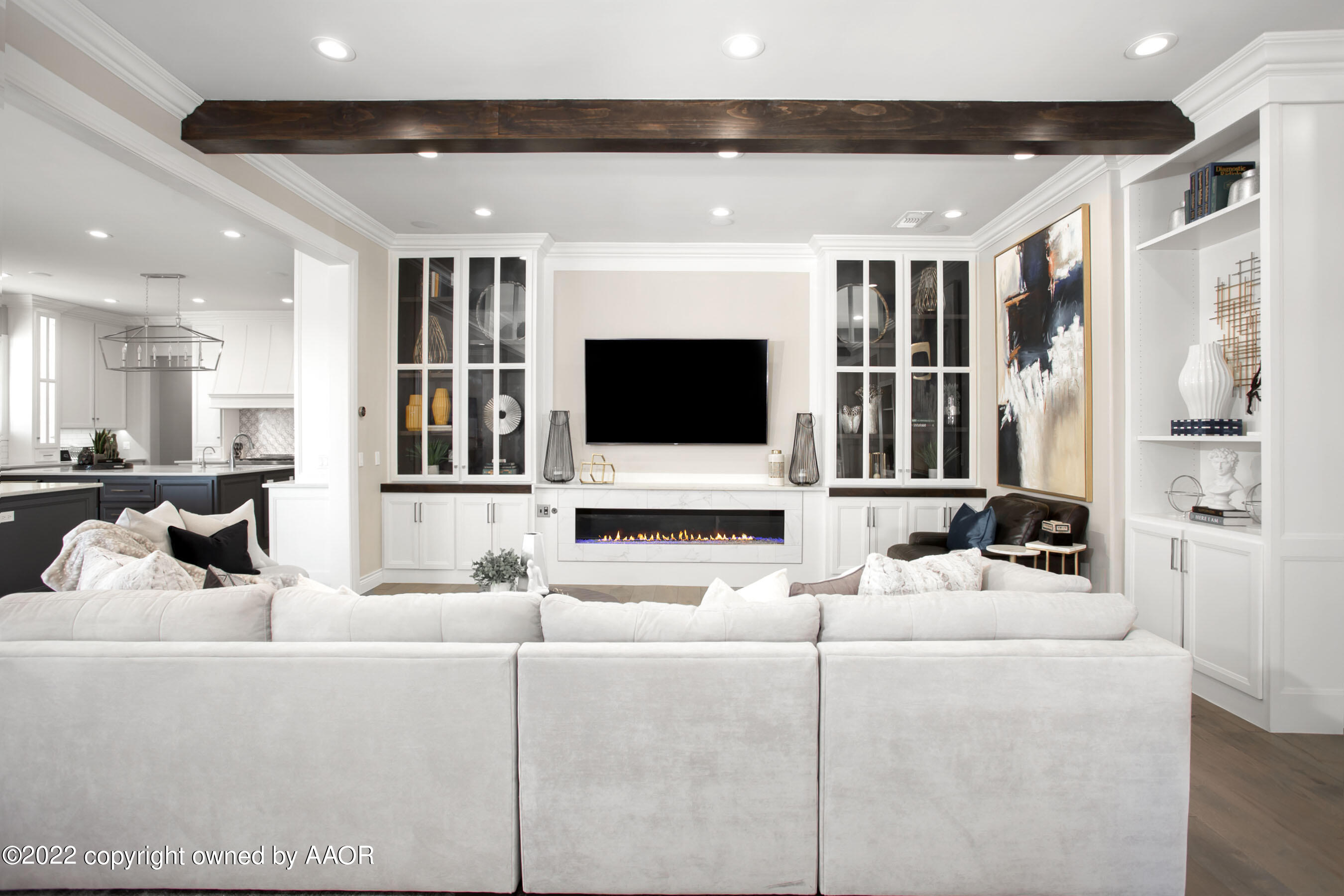 9101 Blackhawk Road Amarillo, TX 79119 - Photo 22 of 73 a living room with furniture and a flat screen tv