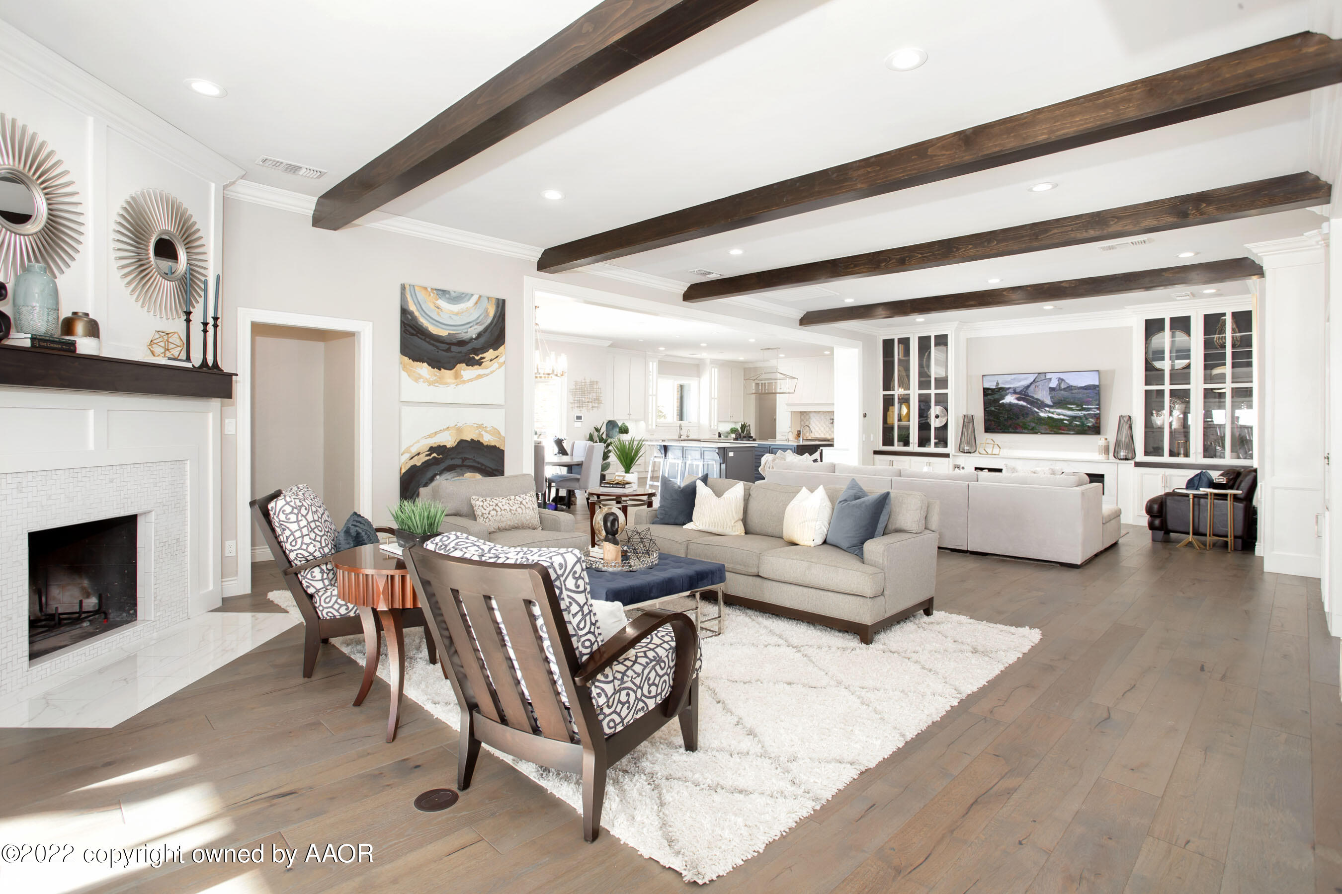 9101 Blackhawk Road Amarillo, TX 79119 - Photo 24 of 73 a living room with furniture fireplace and a large window